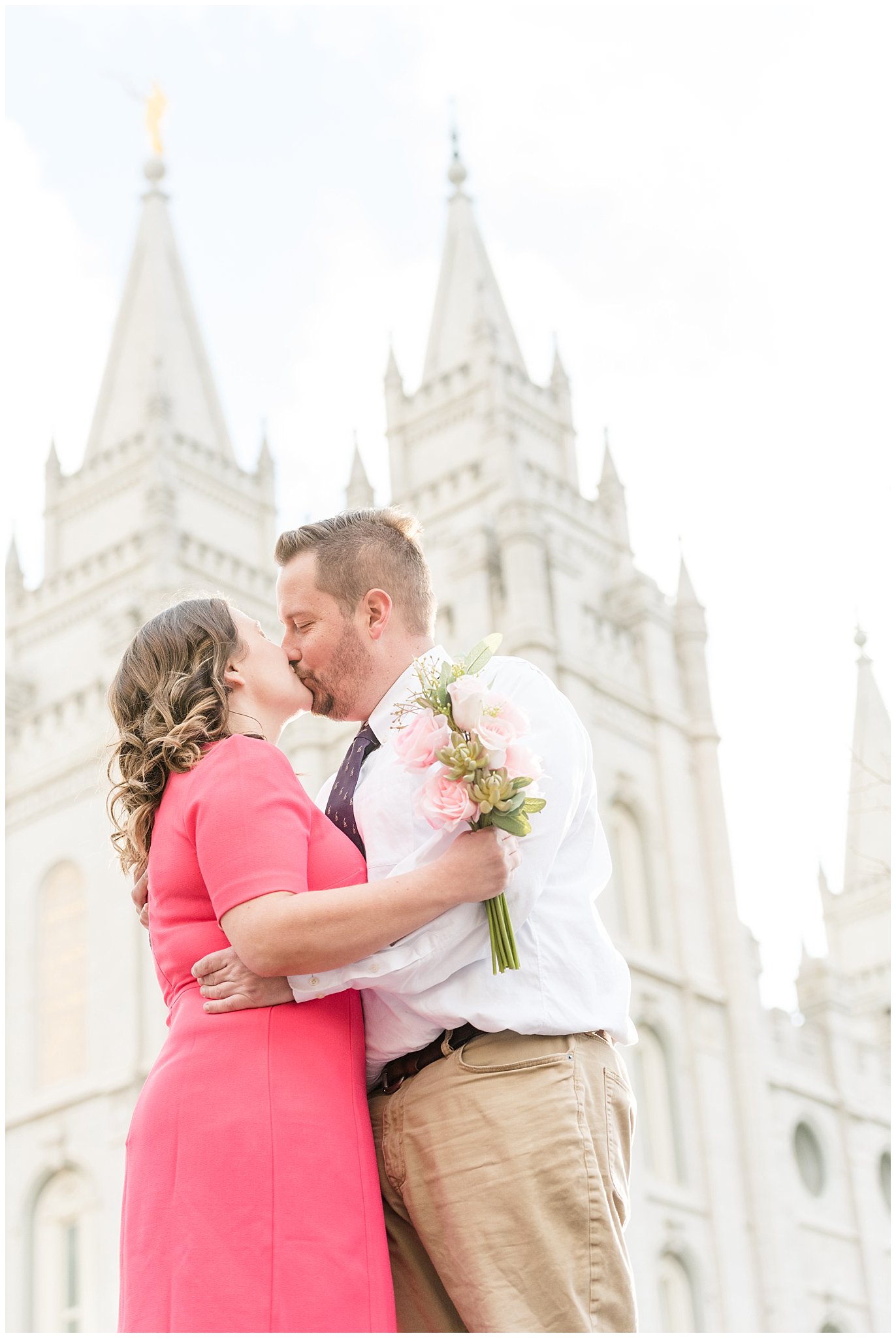 Couple kissing with Salt Lake Temple behind them | Salt Lake Temple Sealing | Jessie and Dallin Photography