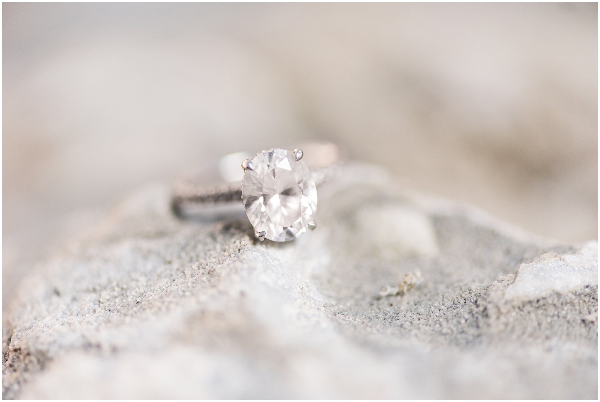 Beach and rocks ring shot | Antelope Island Engagements | Utah Wedding Photographers | Jessie and Dallin Photography