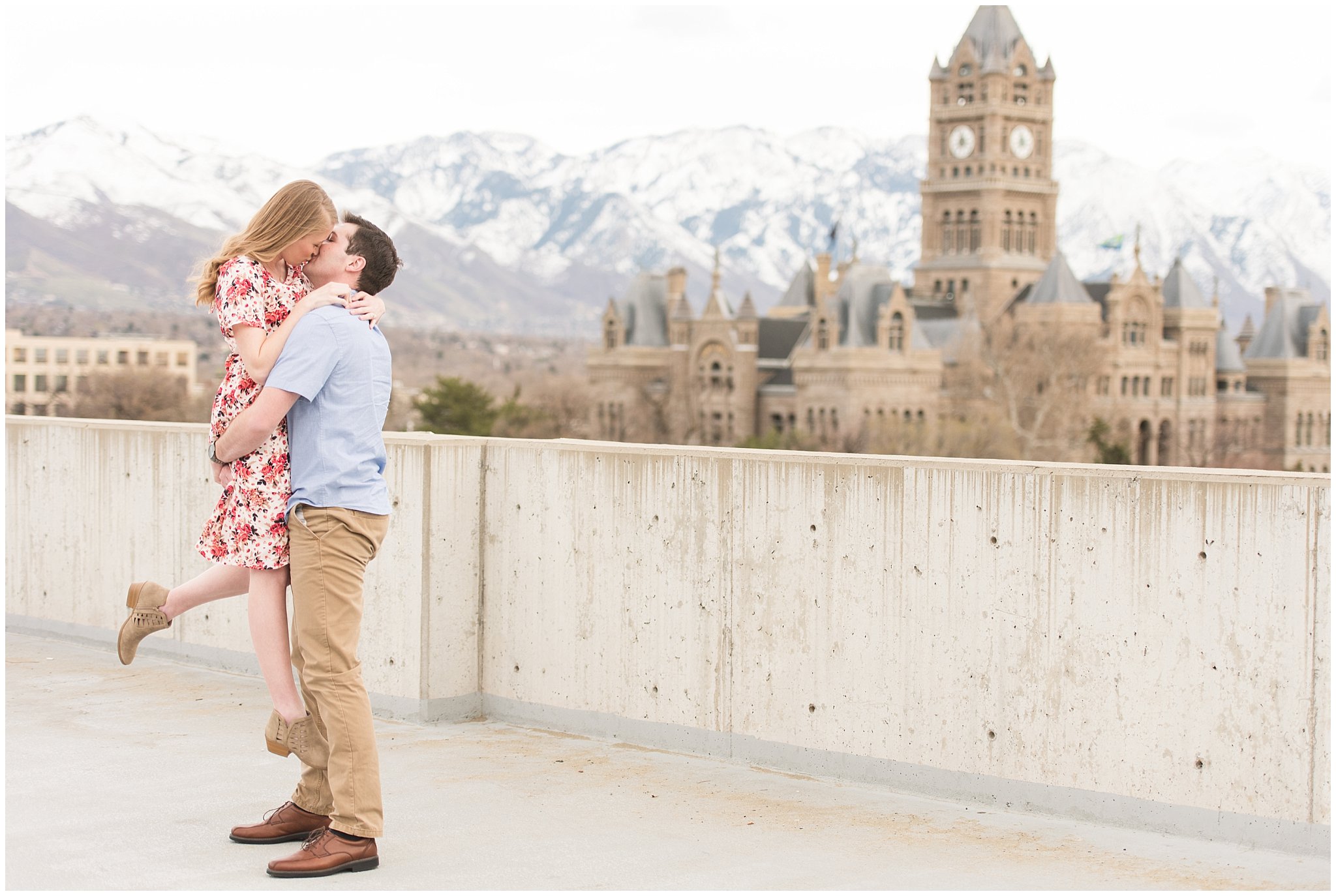 Couple kiss on rooftop | Downtown Salt Lake and Ensign Peak Engagement | Utah Wedding Photographers | Jessie and Dallin Photography