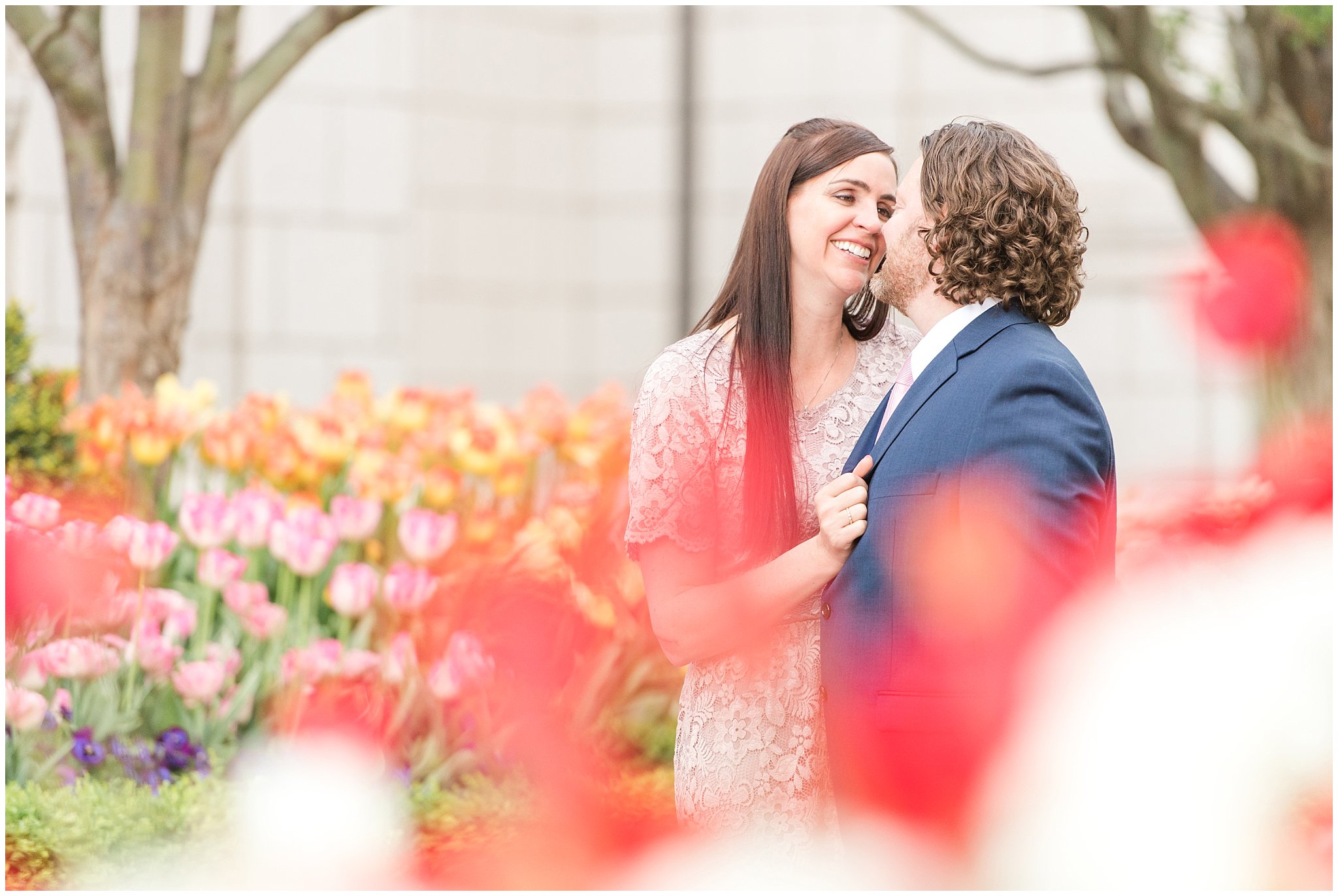 Couple in blue suit and blush dress outside at the Grand America Hotel | Sealing at the Salt Lake Temple and Grand America | Jessie and Dallin Photography