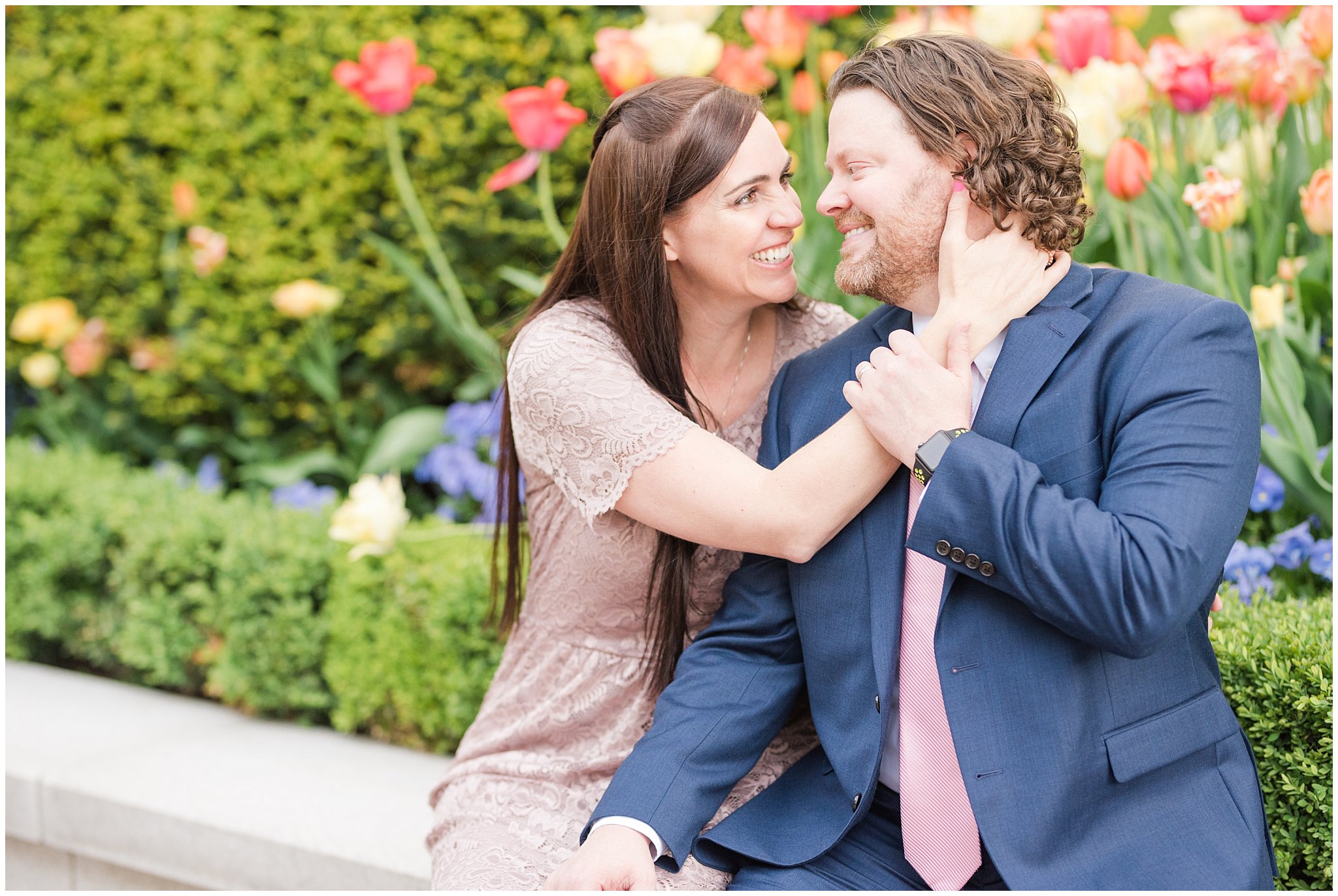 Couple in blue suit and blush dress outside at the Grand America Hotel | Sealing at the Salt Lake Temple and Grand America | Jessie and Dallin Photography