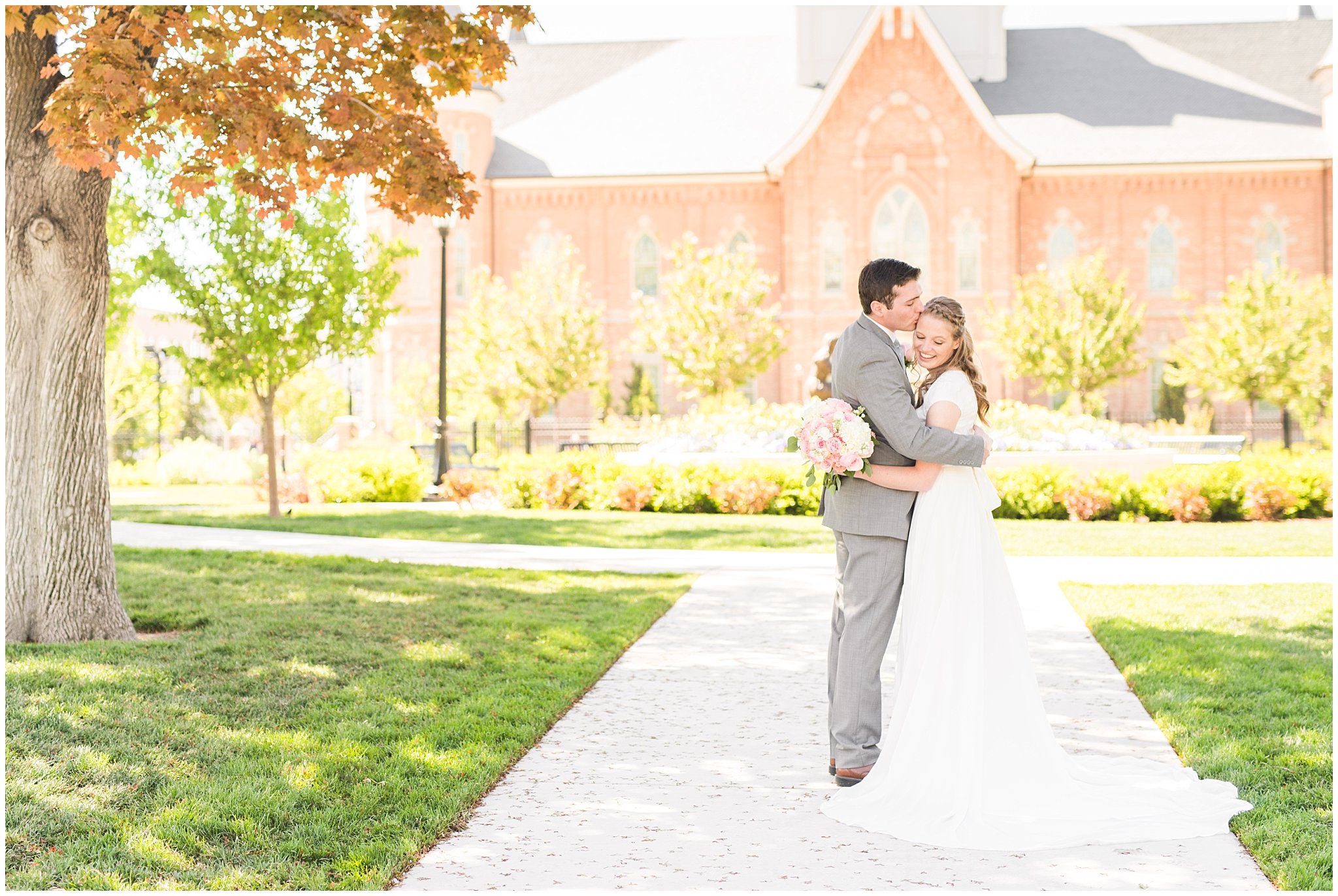 Bride and groom in front of Provo City Center temple with grey, blush, and light blue wedding colors | Spring Provo City Center Temple Wedding | Utah Wedding Photographers | Jessie and Dallin Photography