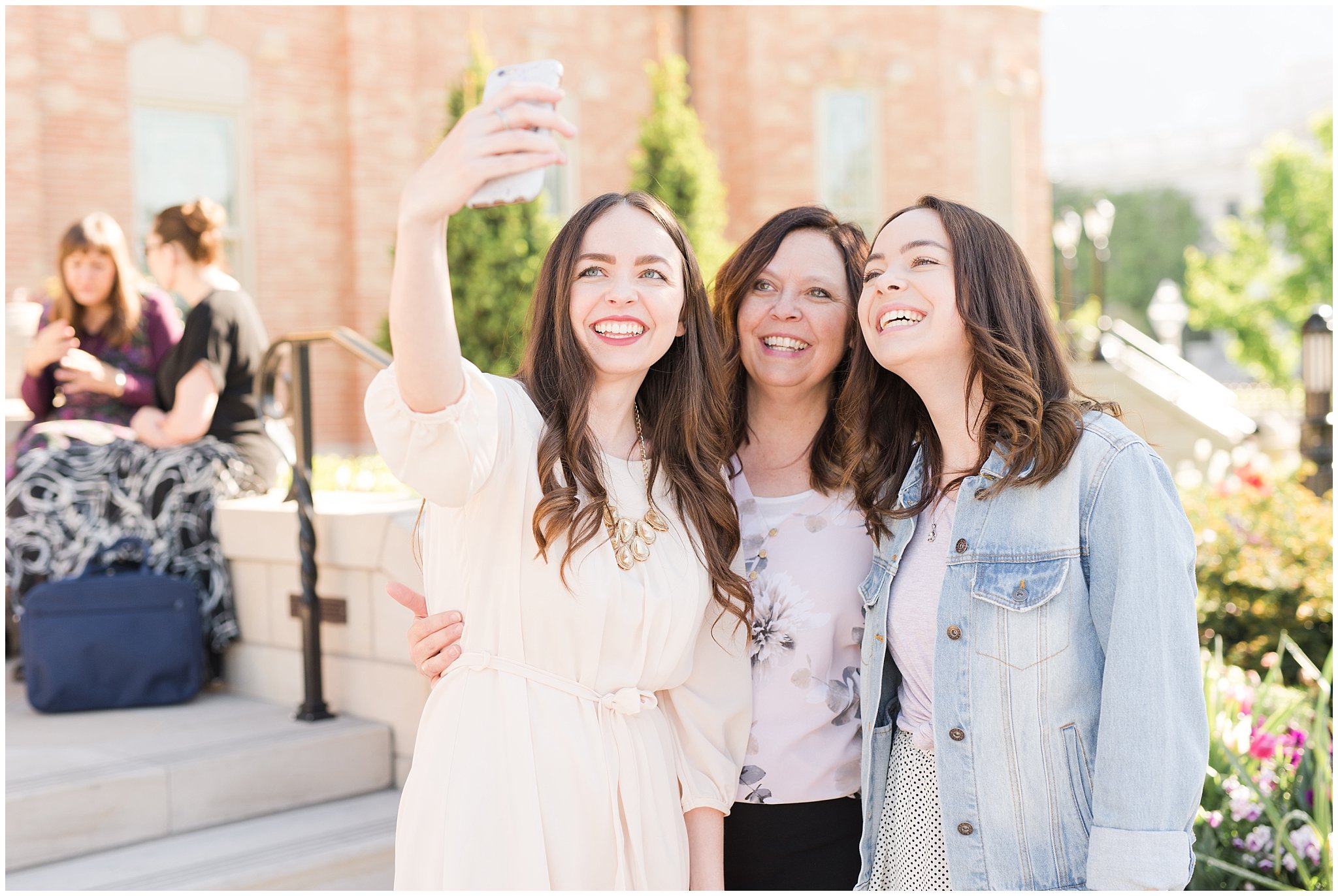 Wedding guests at Provo City Center temple with grey, blush, and light blue wedding colors | Spring Provo City Center Temple Wedding | Utah Wedding Photographers | Jessie and Dallin Photography