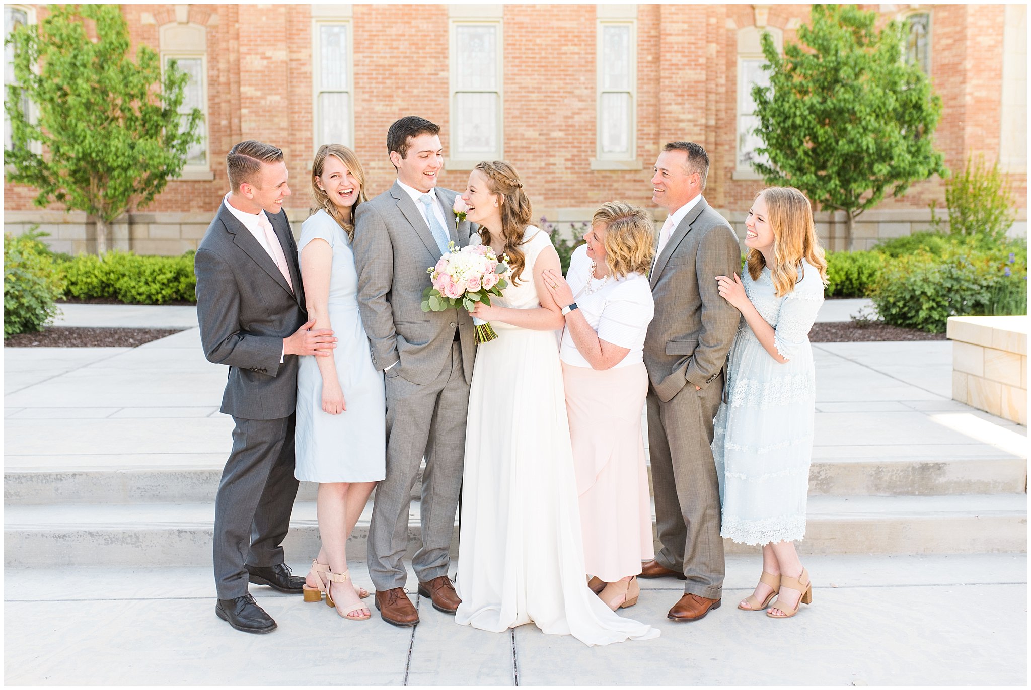 Bride and groom with family at Provo City Center temple with grey, blush, and light blue wedding colors | Spring Provo City Center Temple Wedding | Utah Wedding Photographers | Jessie and Dallin Photography