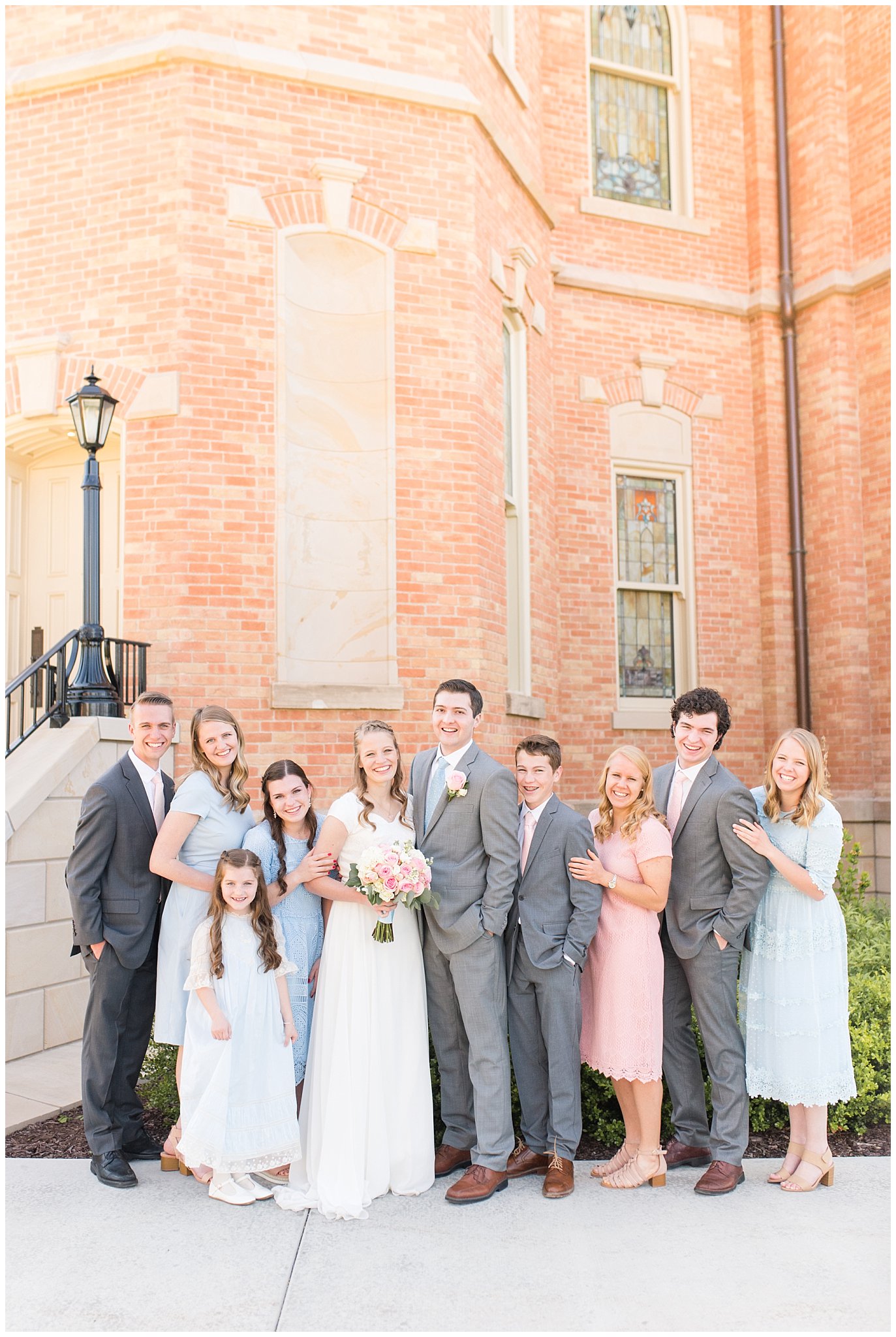 Bridal party at Provo City Center temple with grey, blush, and light blue wedding colors | Spring Provo City Center Temple Wedding | Utah Wedding Photographers | Jessie and Dallin Photography
