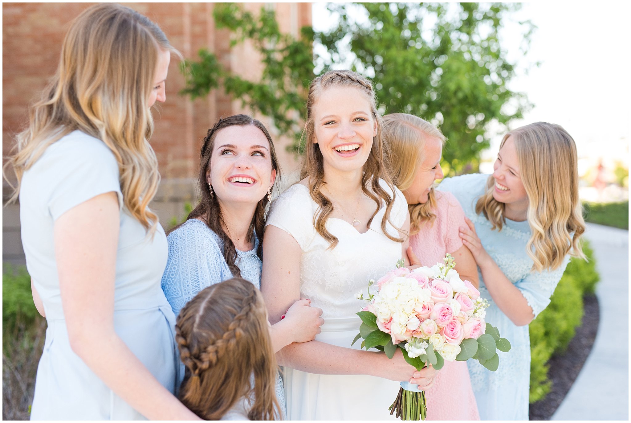 Bridesmaids at Provo City Center temple with grey, blush, and light blue wedding colors | Spring Provo City Center Temple Wedding | Utah Wedding Photographers | Jessie and Dallin Photography