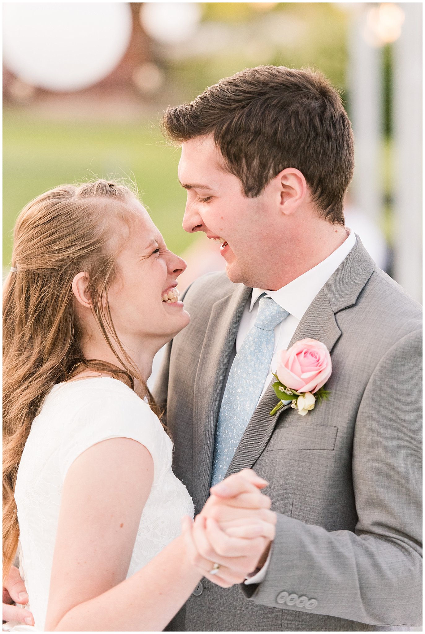 First dance candid moments | Backyard outdoor spring wedding with grey, blush, and light blue wedding colors | Spring Provo City Center Temple Wedding | Utah Wedding Photographers | Jessie and Dallin Photography