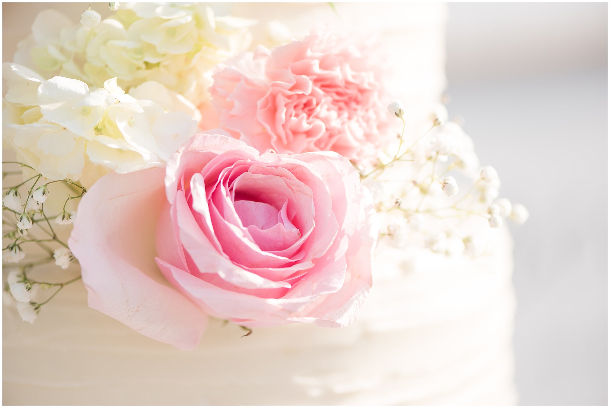 White ruffled wedding cake with pink roses | Backyard outdoor spring wedding with grey, blush, and light blue wedding colors | Spring Provo City Center Temple Wedding | Utah Wedding Photographers | Jessie and Dallin Photography