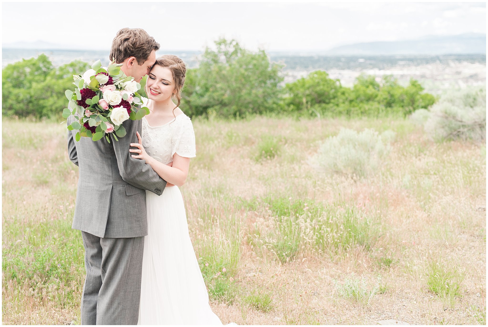 Bride and groom portraits overlooking Salt Lake City | Grey, Burgundy, and Gold Wedding | Draper Temple and South Mountain Wedding | Utah Wedding Photographers | Jessie and Dallin Photography