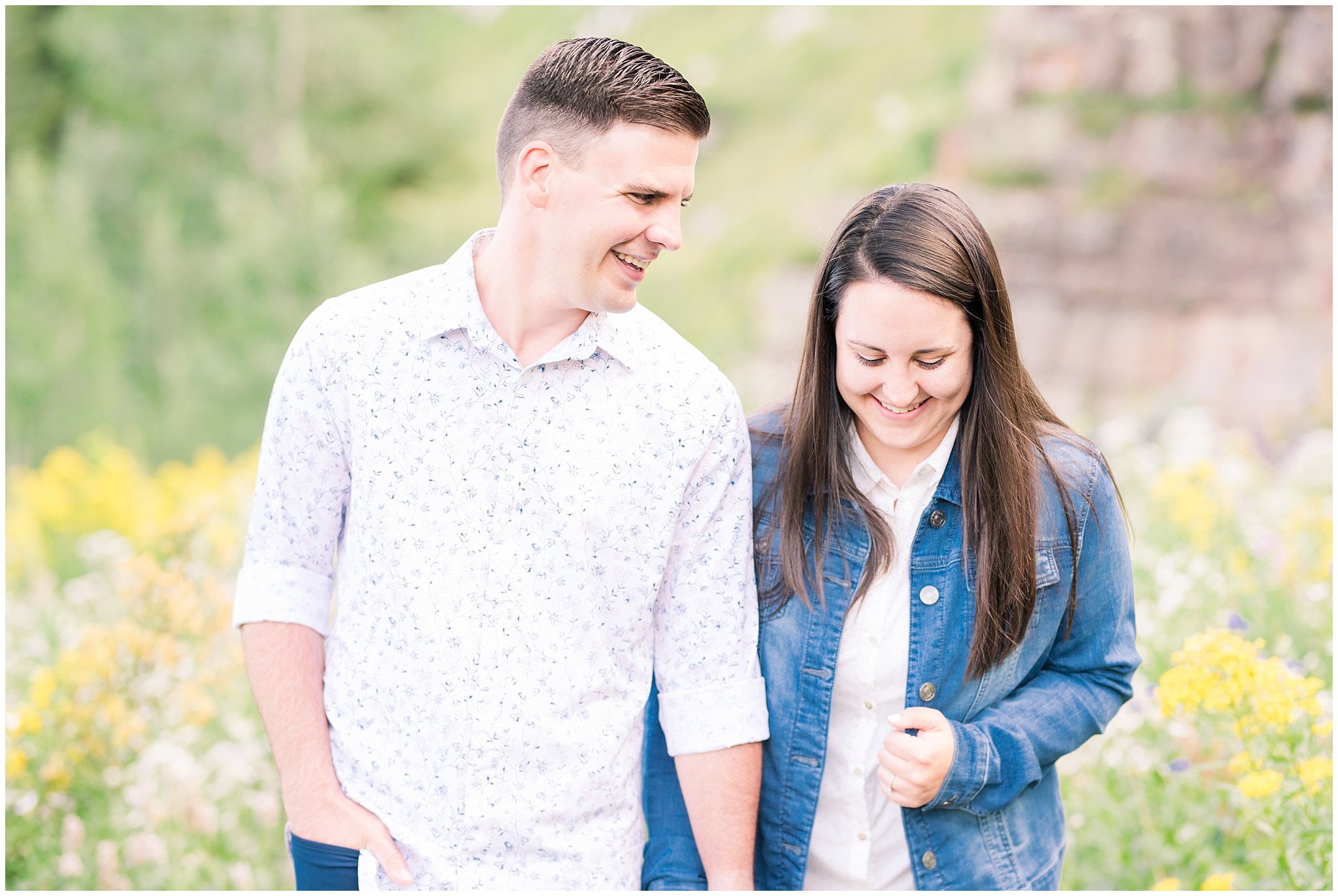 Couple dressed in jean jacket and button up shirt for engagement pictures in the wildflowers | Tony Grove Wildflower Engagement | Utah Mountain Engagement | Jessie and Dallin Photography