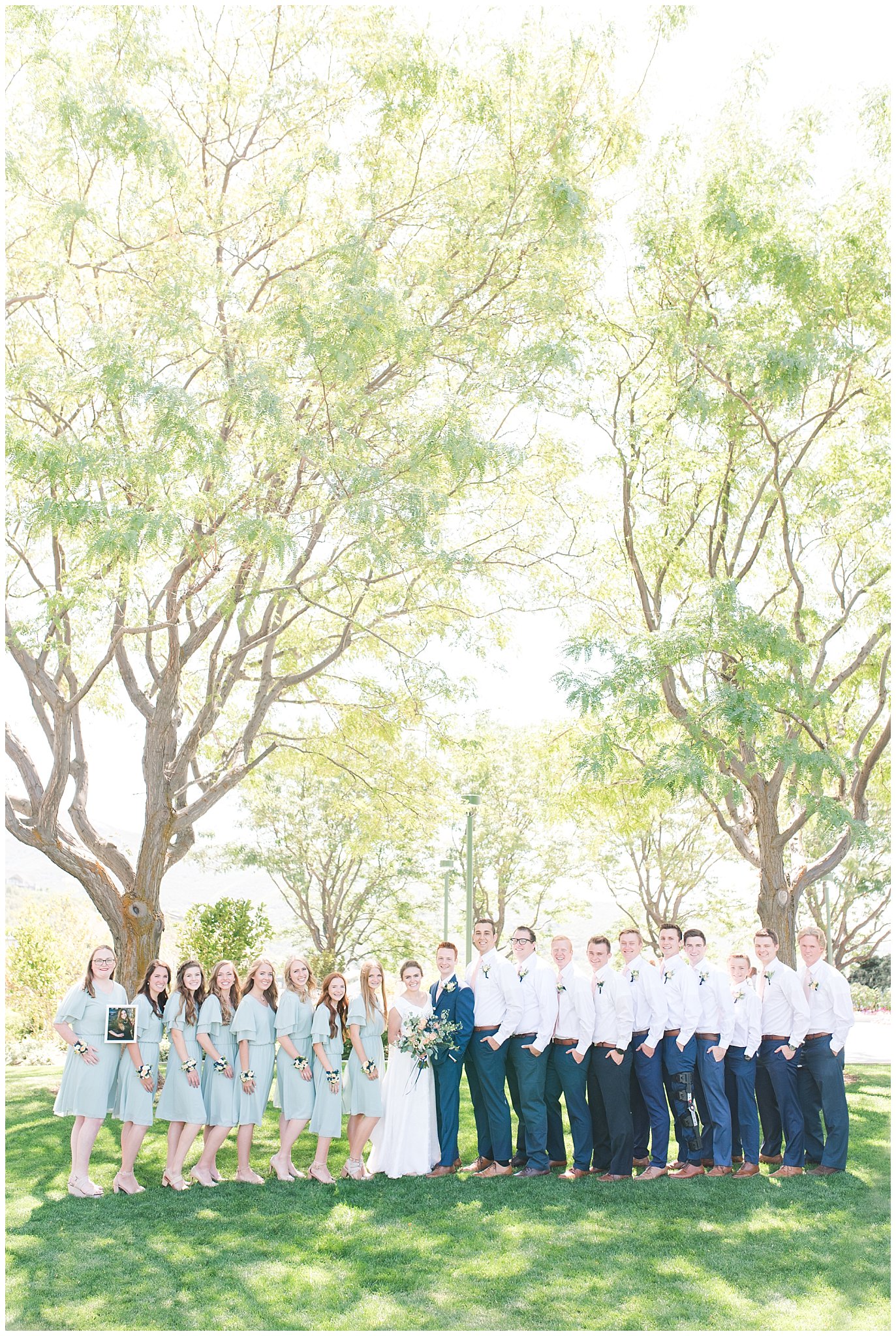 Bridal party of bridesmaids in sage dresses and groomsmen with blush ties | Bountiful Temple Wedding and Oak Hills Reception | Jessie and Dallin Photography