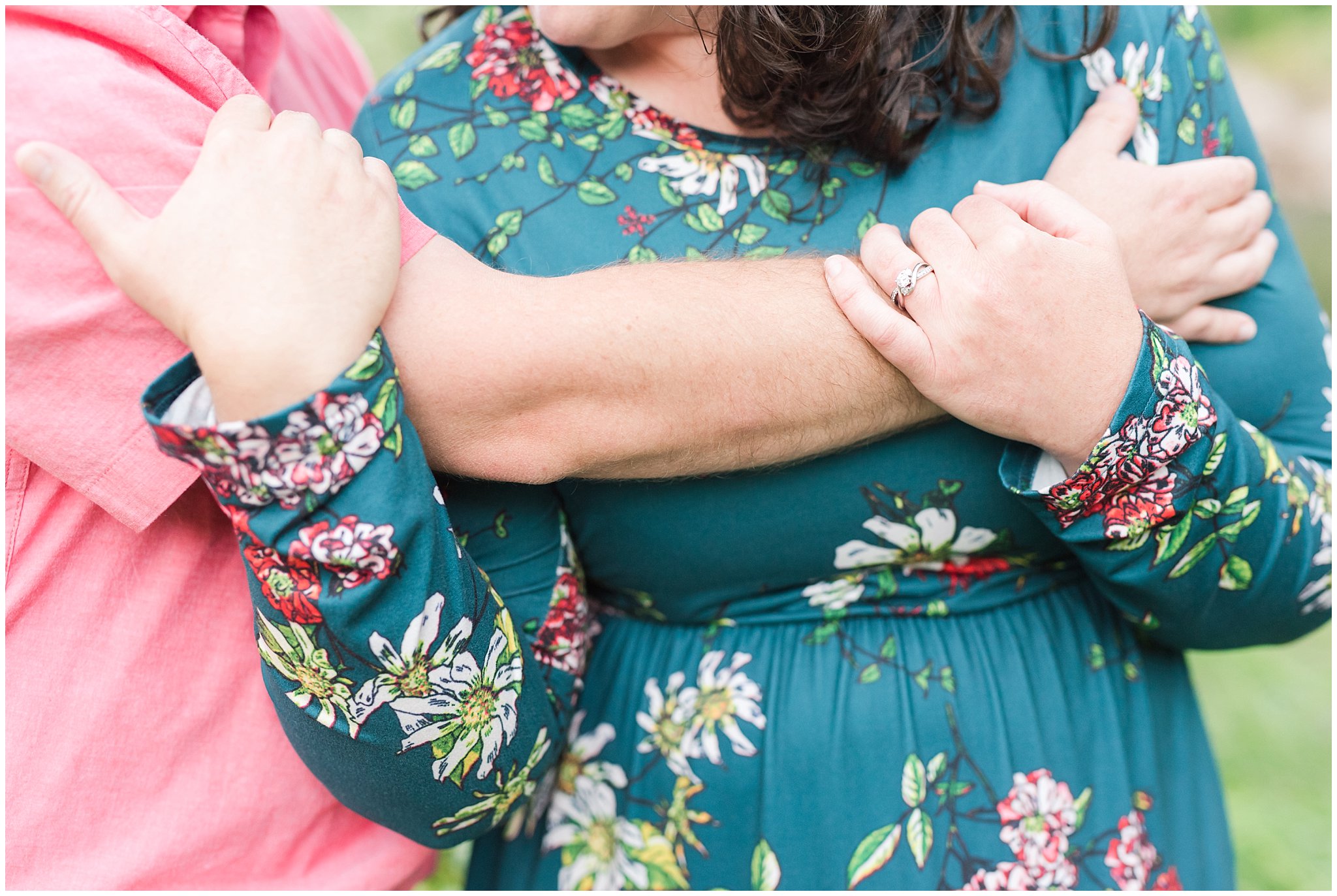 Couple in blue green floral dress and pink shirt by the Ogden river | Fort Buenaventura Summer Engagement Session | Jessie and Dallin Photography