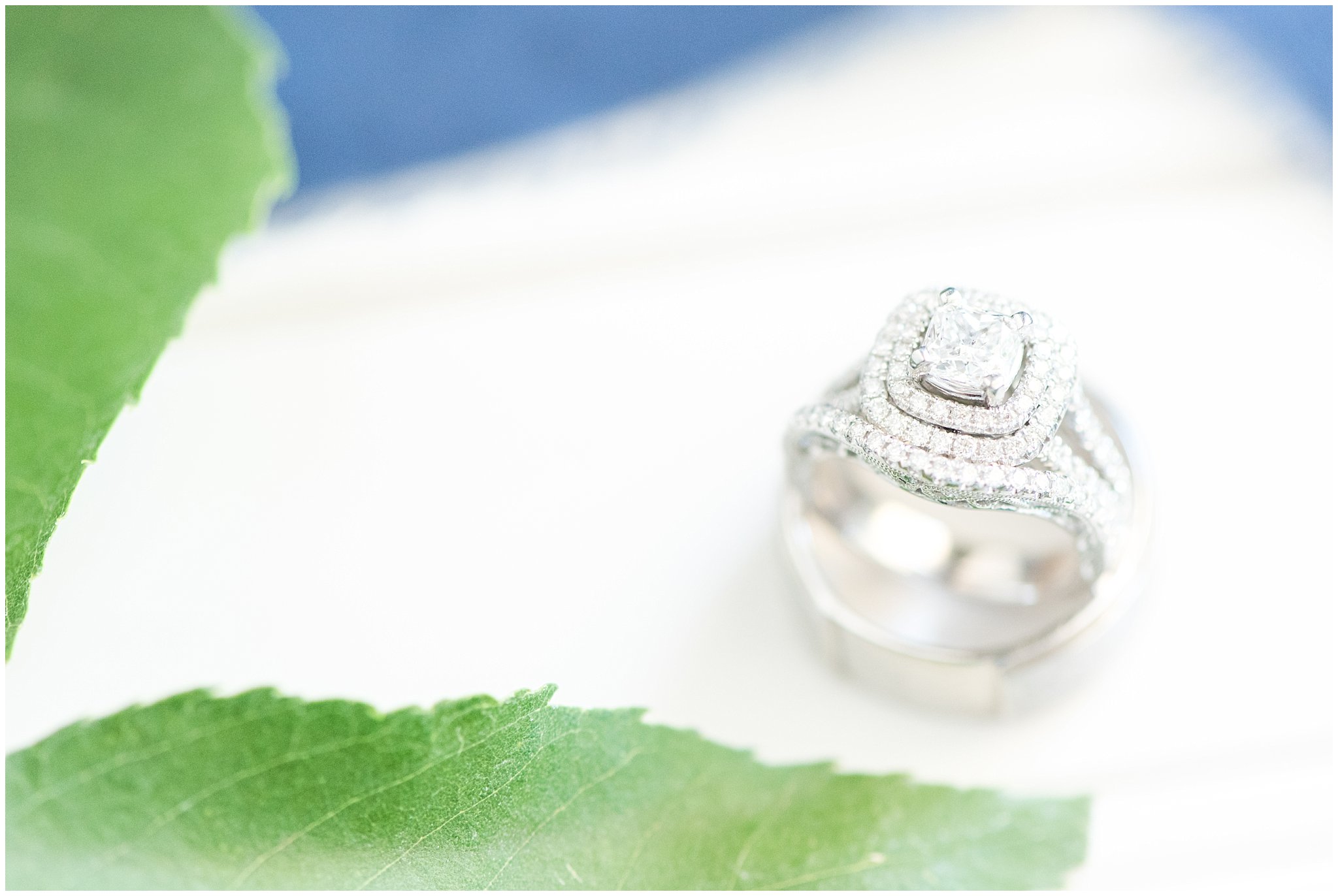 Wedding ring on blue ribbon | Log Haven Summer Mountain Wedding | Jessie and Dallin Photography