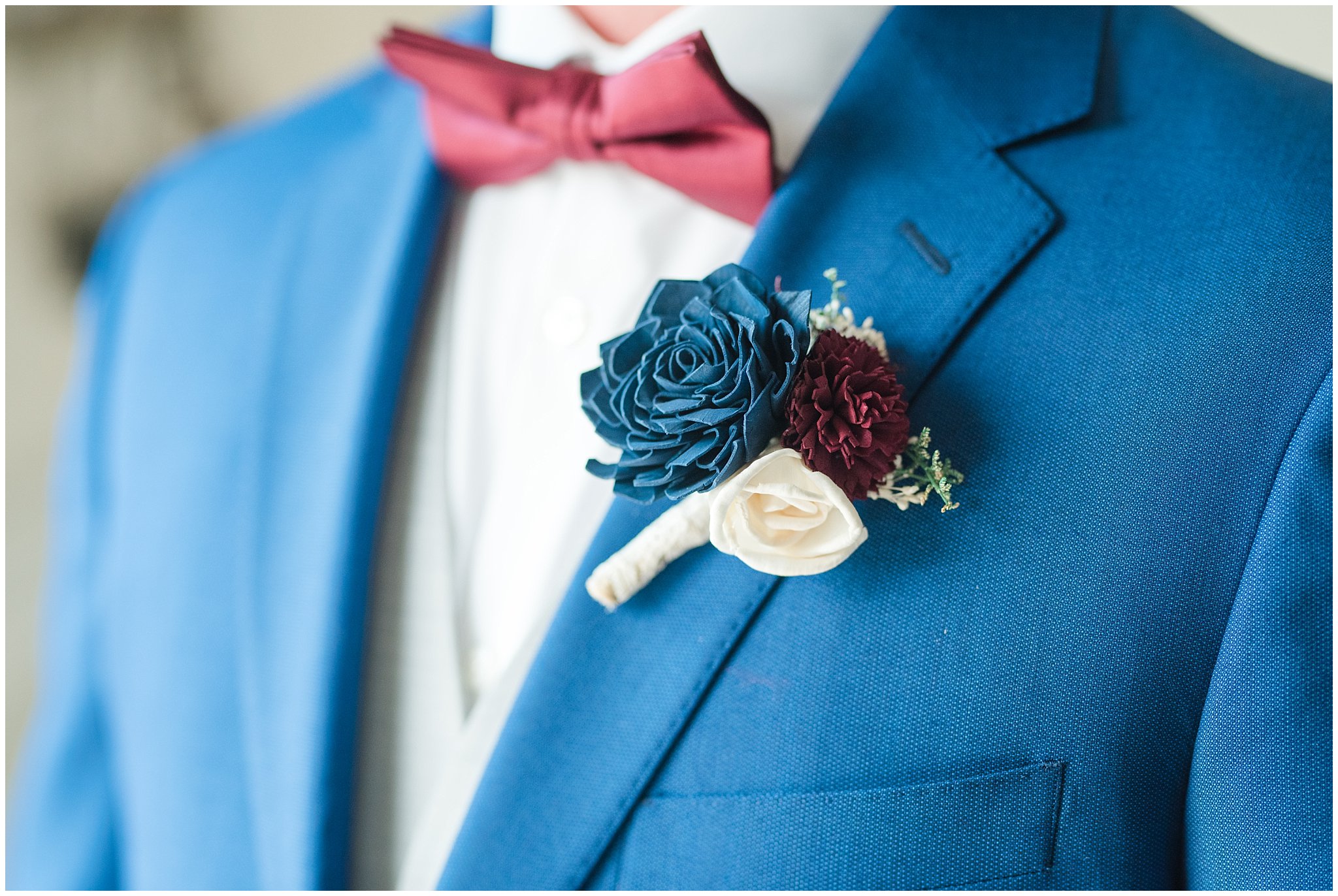 Groom in cornish blue suit with burgundy bow tie and brown leather shoes and wooden flower boutonniere | Log Haven Summer Mountain Wedding | Jessie and Dallin Photography