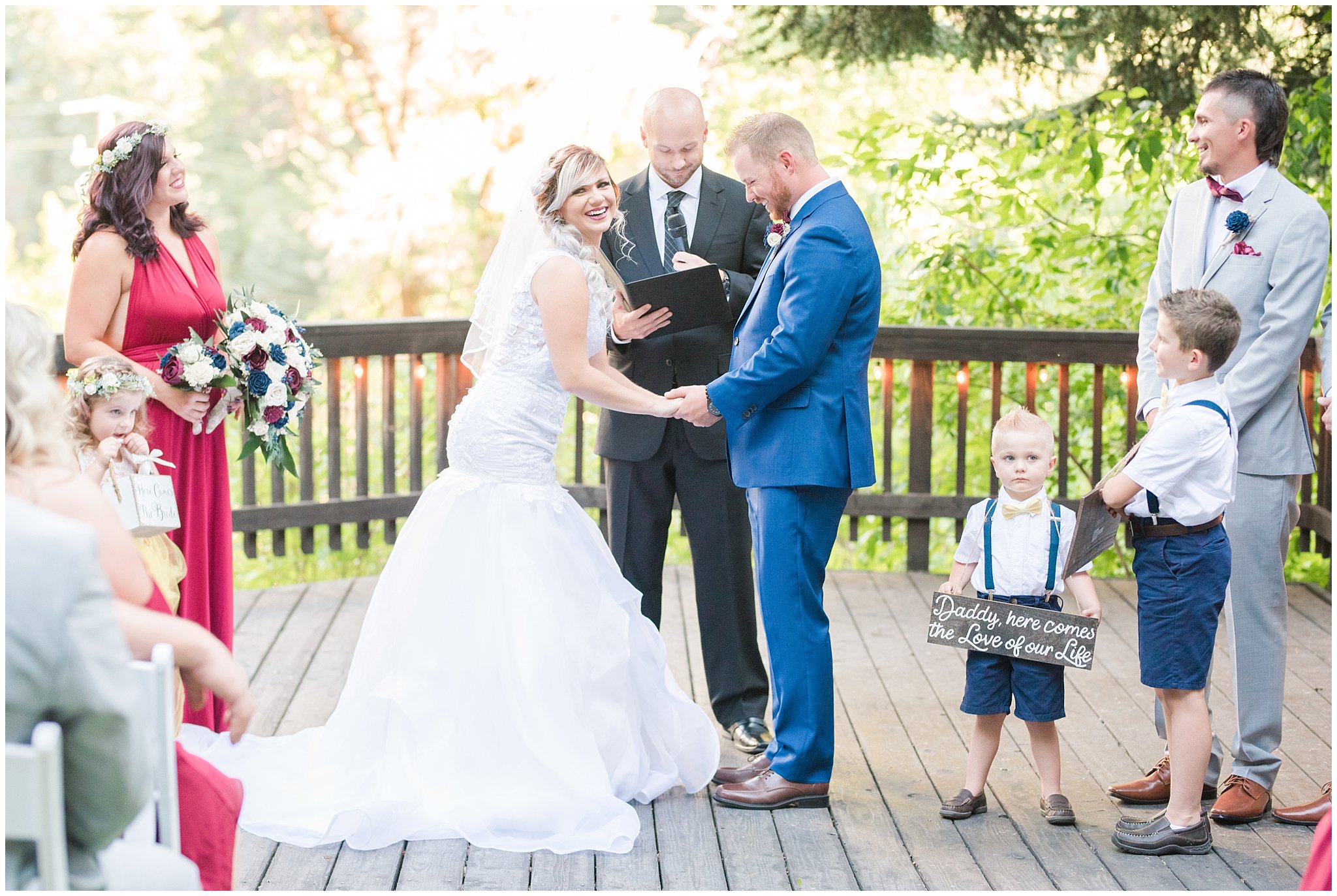 Bride and groom hold hands at the alter | Log Haven Summer Mountain Wedding | Jessie and Dallin Photography