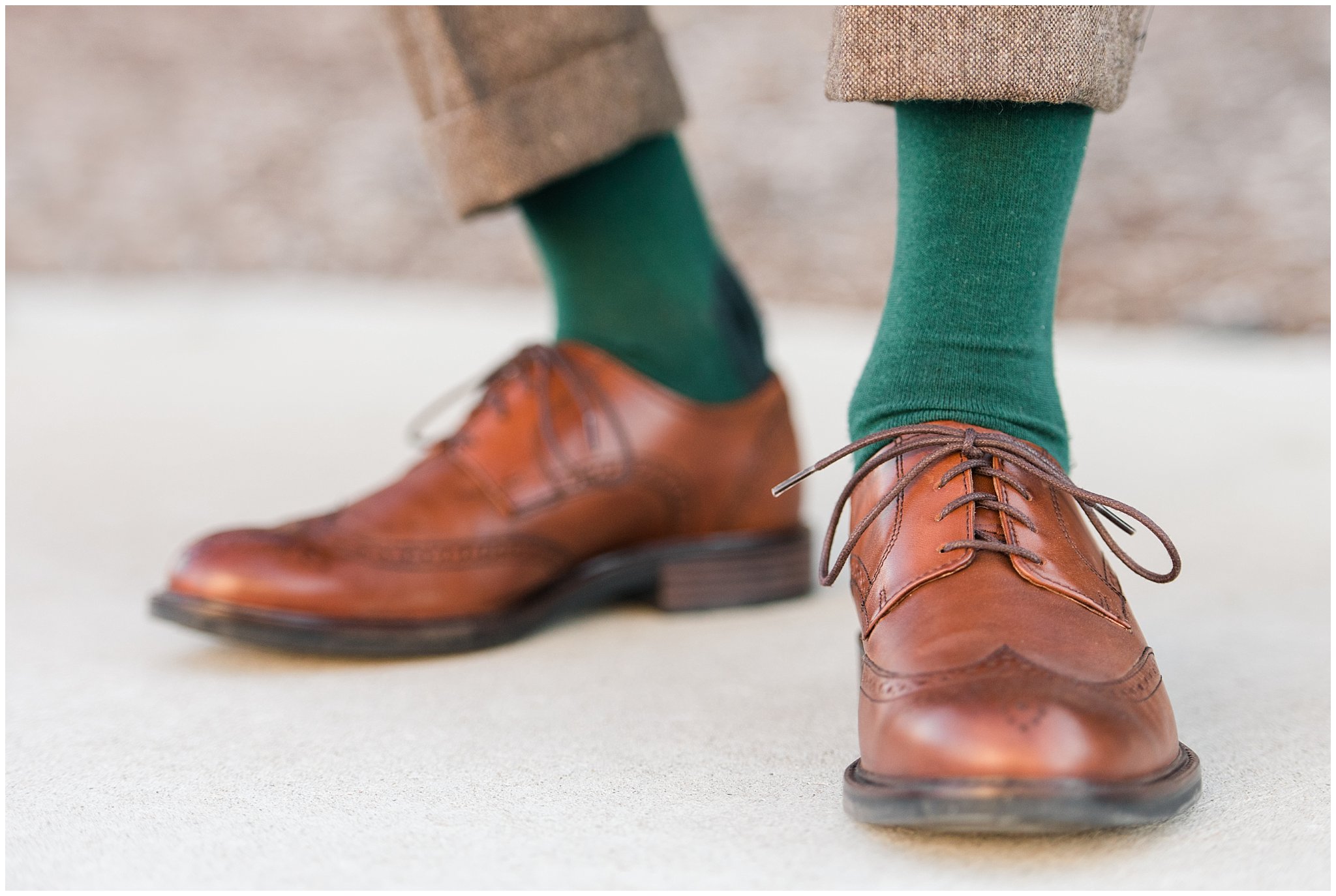 Groom in brown tweed suit with green socks and brown leather shoes | Ogden Temple Winter Formal Session | Jessie and Dallin Photography