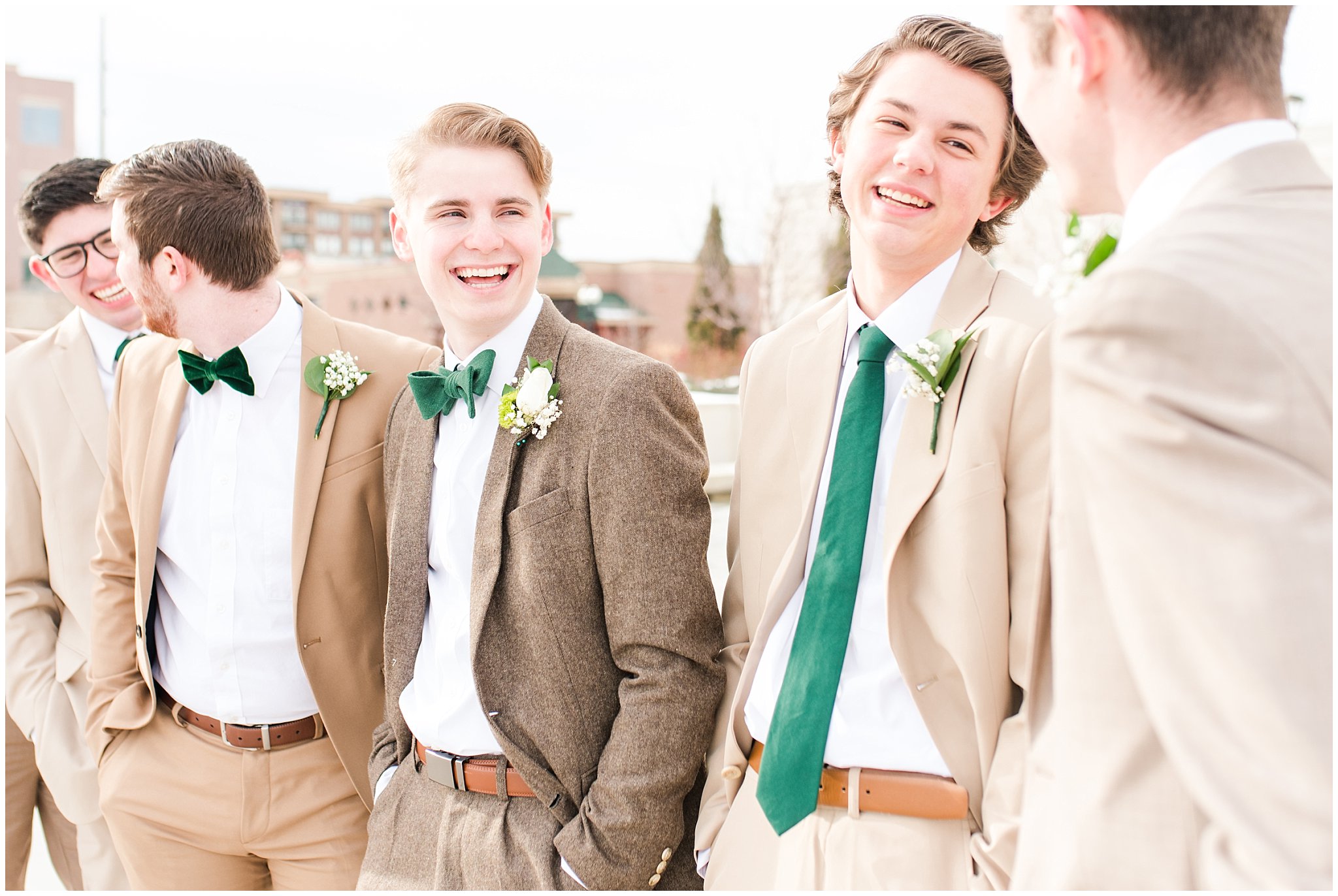 Groomsmen in tan and brown suits with emerald green ties during Ogden Temple winter wedding | Brown, Emerald Green, and white wedding | Ogden Temple and Sweet Magnolia Wedding | Jessie and Dallin Photography
