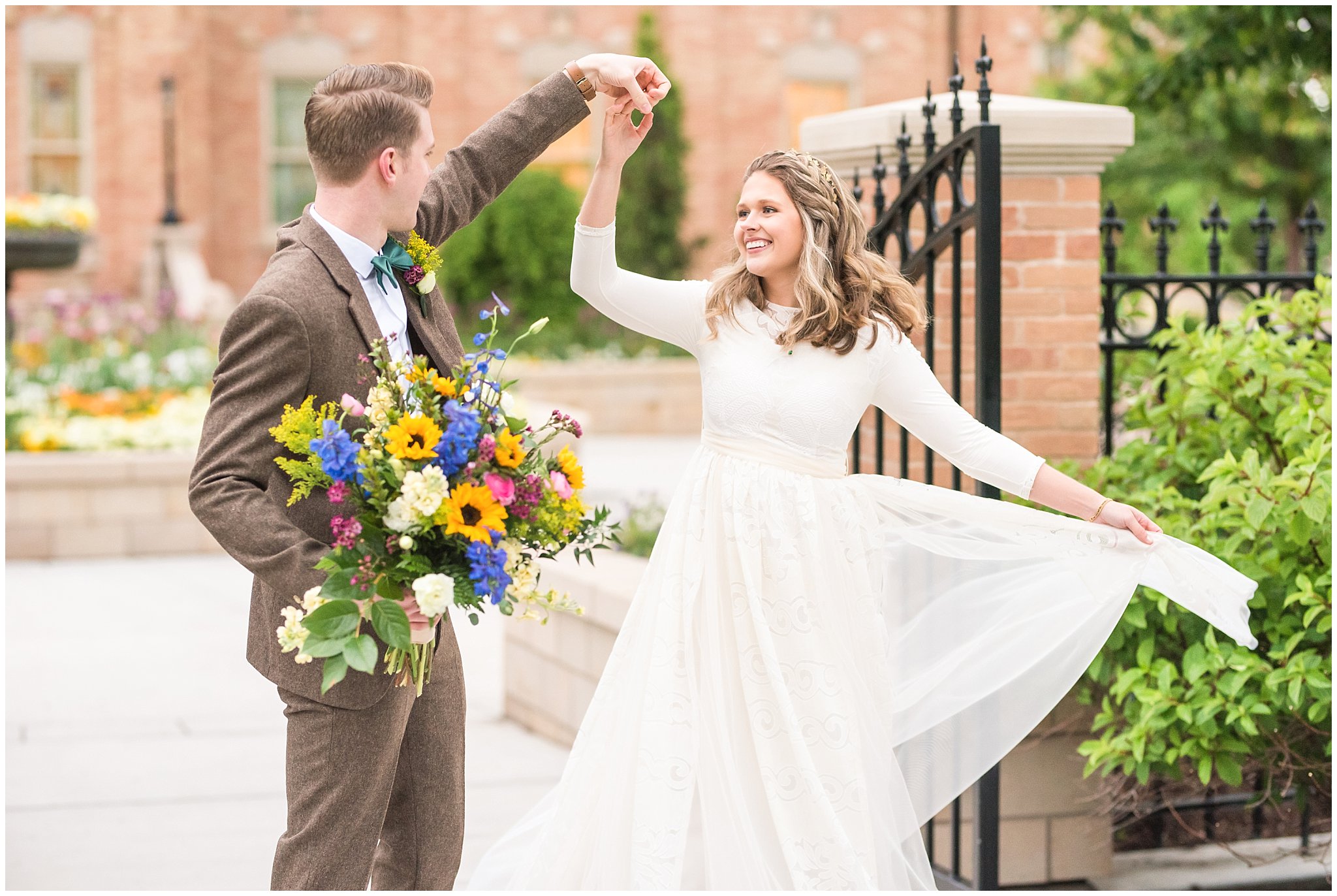 Bride and groom twirl and dance in front of Provo City Center Temple | Top Utah Wedding and Couples Photos 2019 | Jessie and Dallin Photography