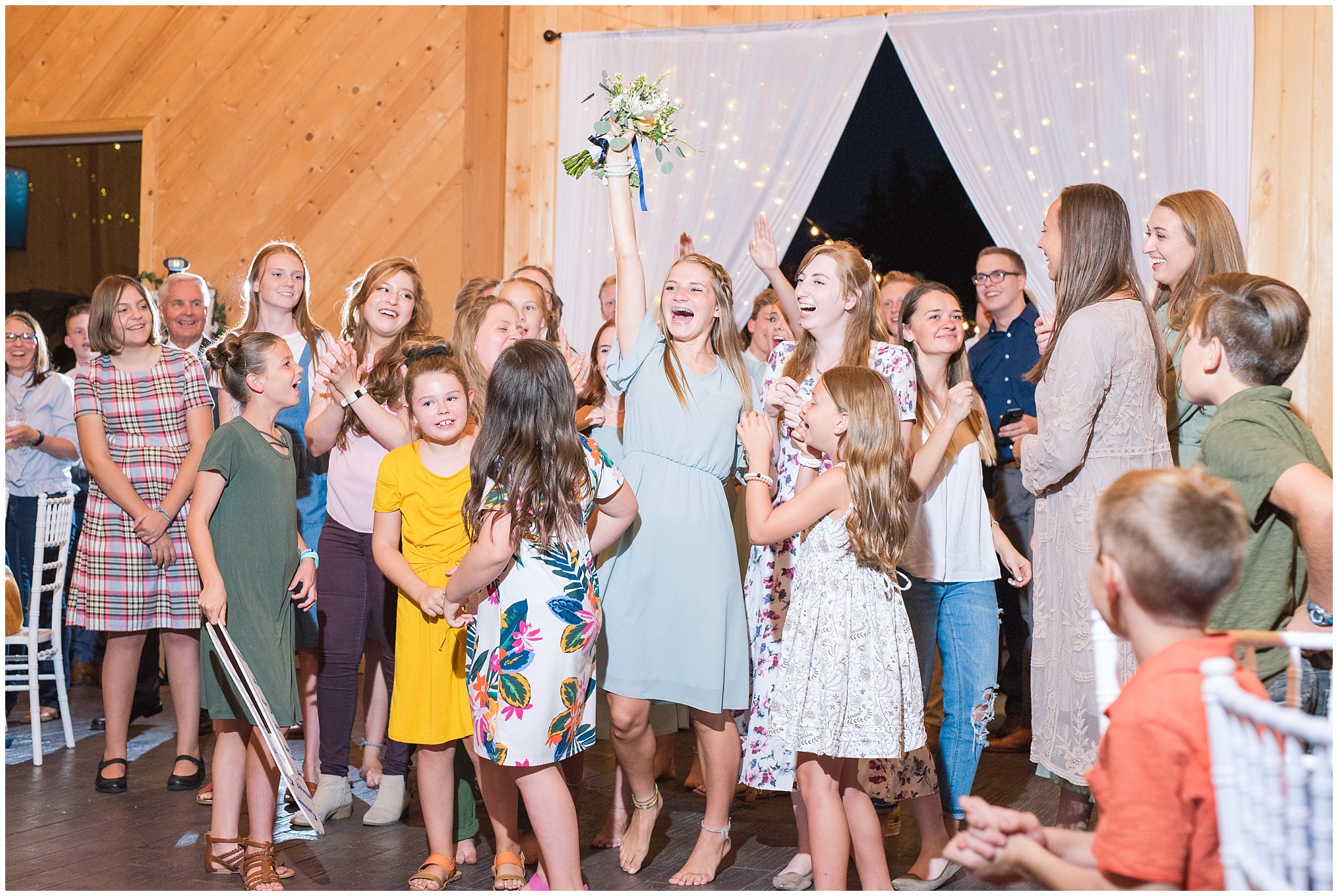 Excited brides maid catches bouquet | Top Utah Wedding and Couples Photos 2019 | Jessie and Dallin Photography