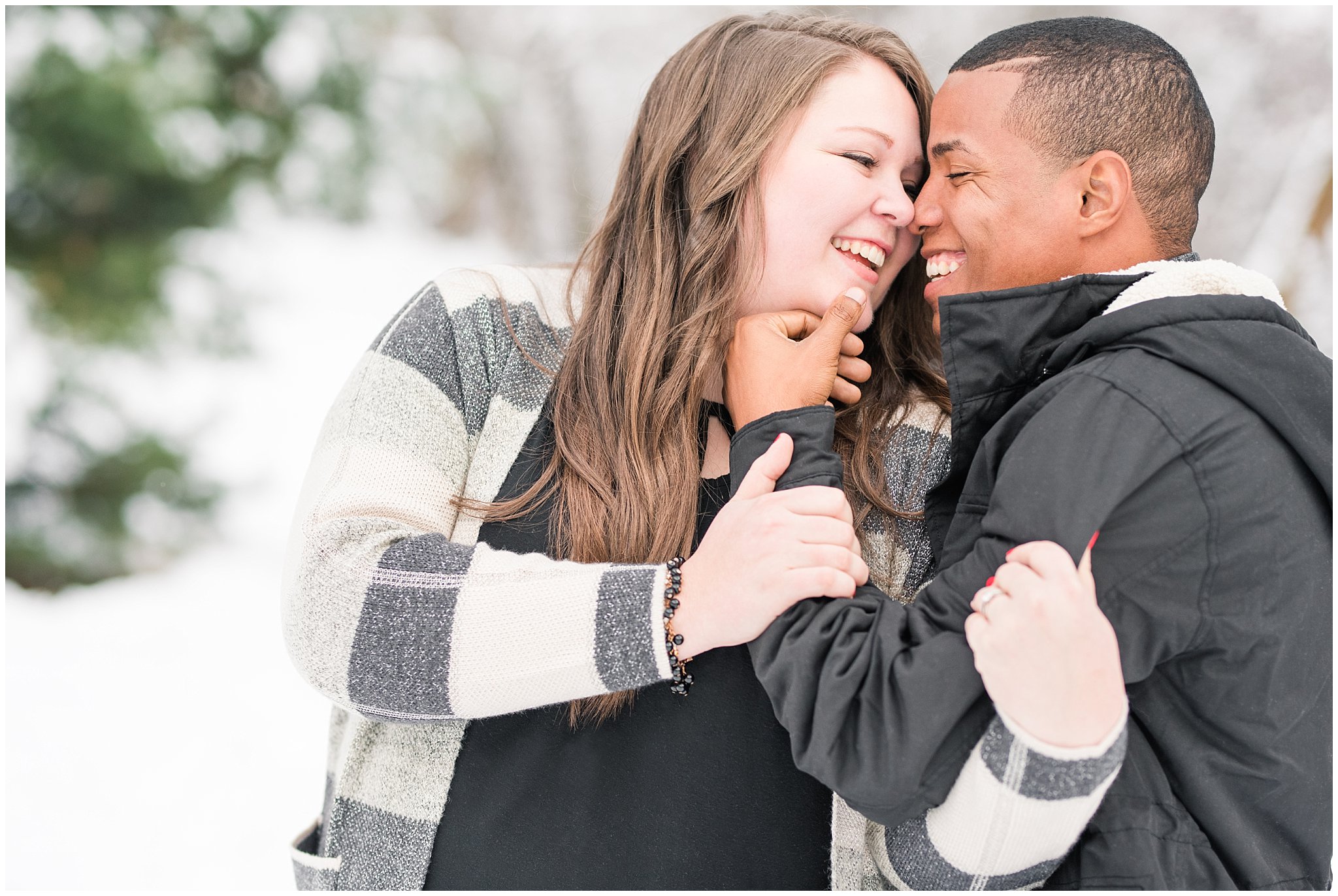 Engagement photos with a couple in the snowy winter Utah mountains with pine trees | Mueller Park and Downtown Winter Engagement Session | Jessie and Dallin Photography