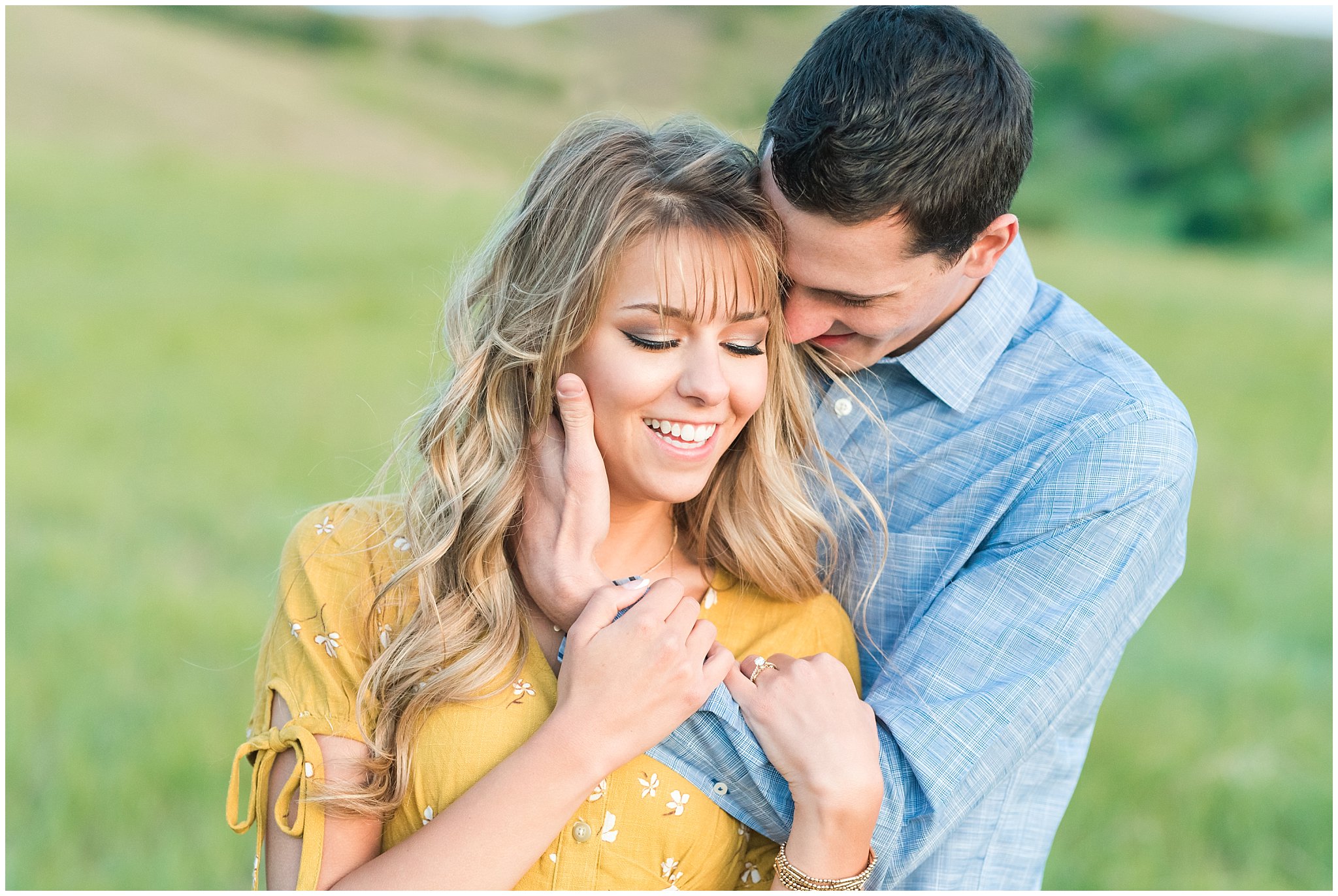 Couple in yellow dress and blue button up shirt on a grassy mountainside at Tunnel Springs | Utah State Capitol and Tunnel Springs Engagement Session | Jessie and Dallin Photography
