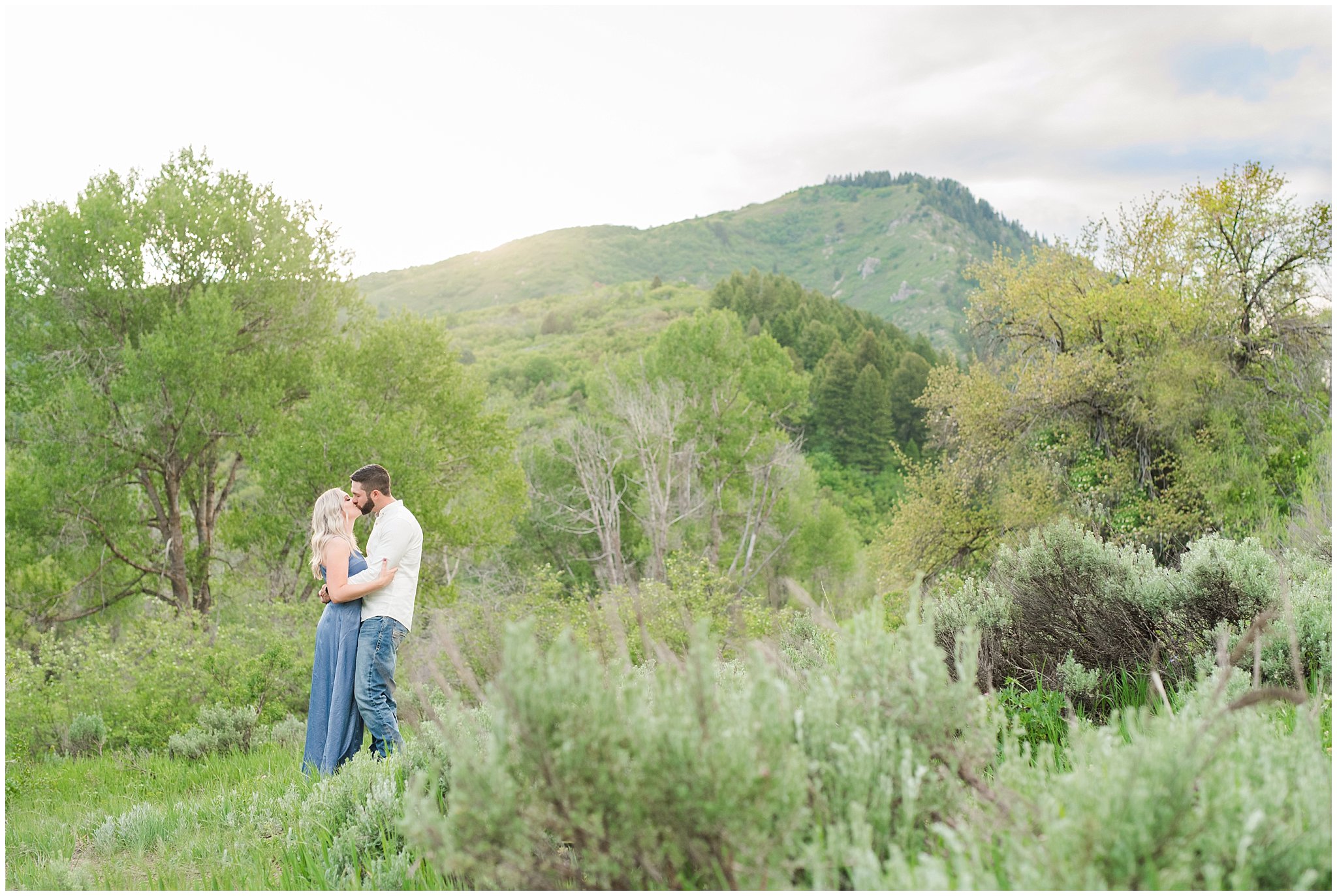 Couple in blue dress and white shirt during Snowbasin Wildflower Engagement | Jessie and Dallin Photography