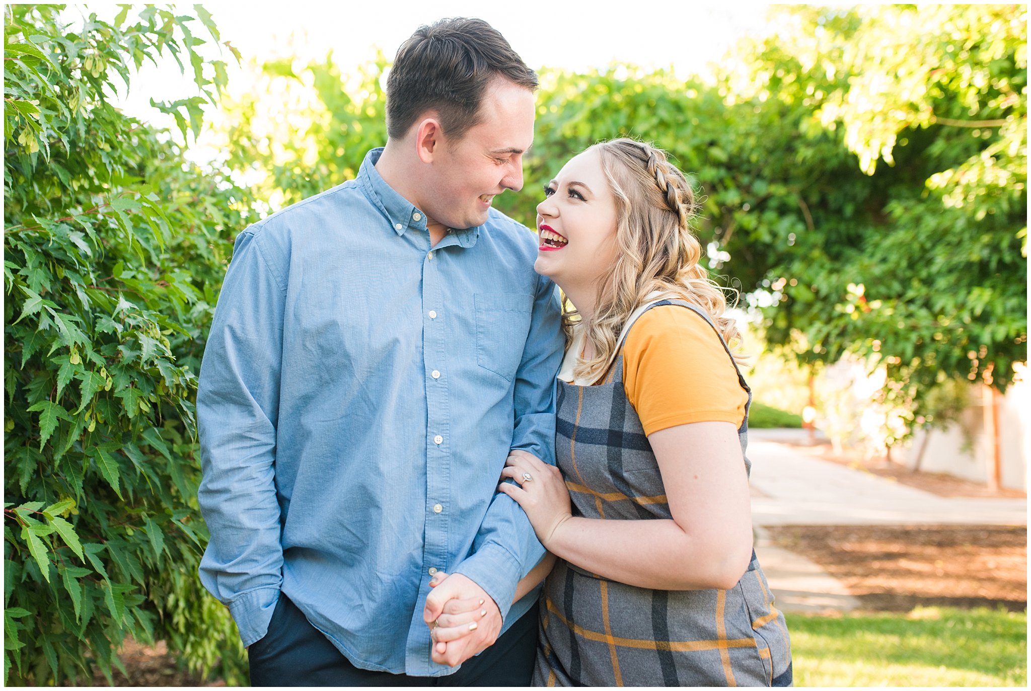 Couple dressed in yellow and blue for garden engagement session | Summer USU Botanical Garden Engagement Session | Jessie and Dallin Photography