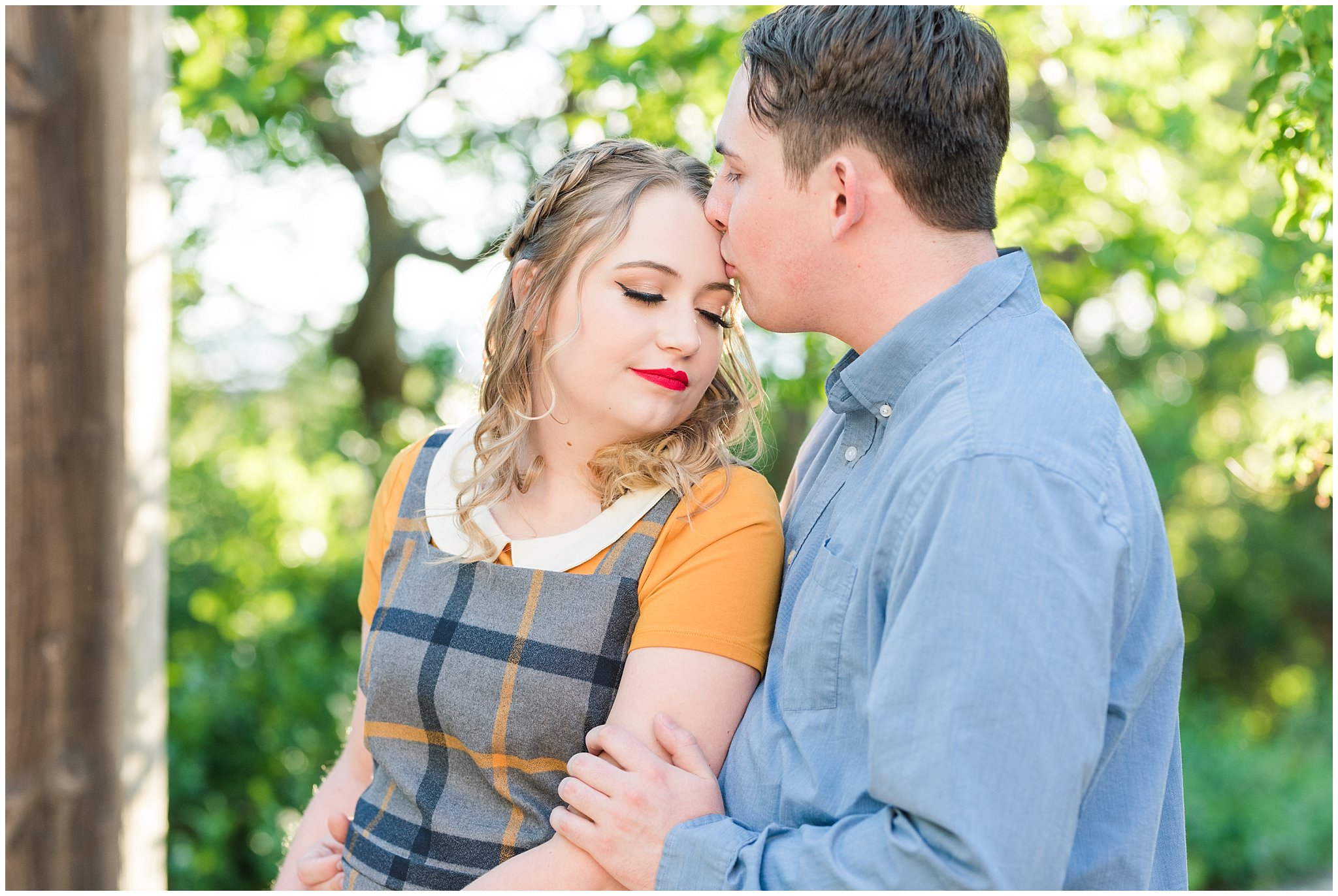 Couple dressed in yellow and blue for garden engagement session | Summer USU Botanical Garden Engagement Session | Jessie and Dallin Photography
