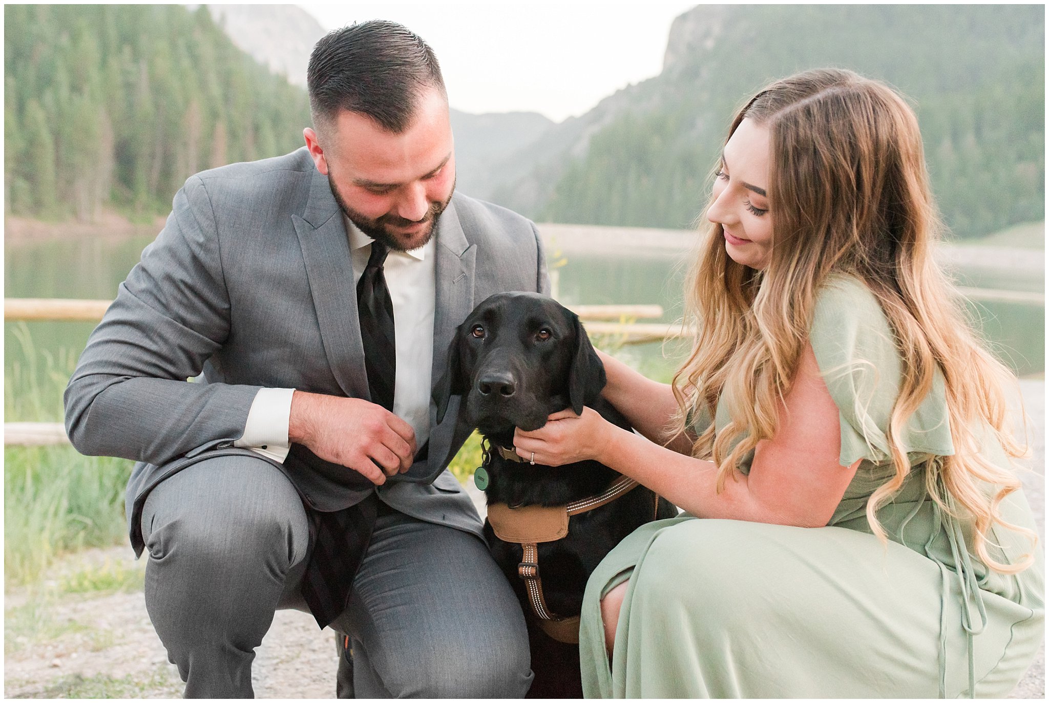 Couple in sage green dress and grey suit with puppy in the mountains | Tibble Fork Summer Engagement Session | Jessie and Dallin Photography