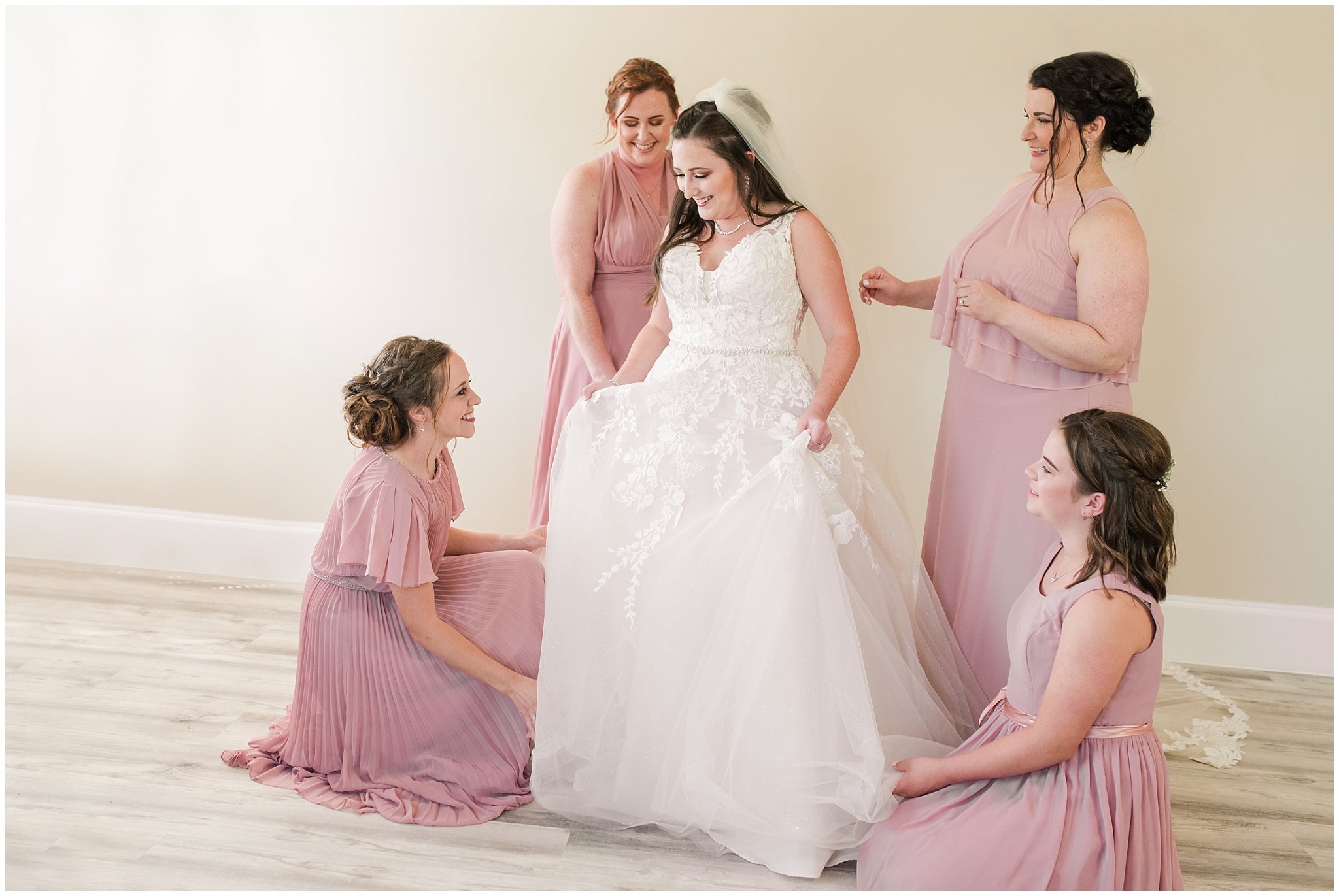 Bride with bridesmaids in dusty rose dresses getting ready | Oak Hills Utah Dusty Rose and Gray Summer Wedding | Jessie and Dallin Photography
