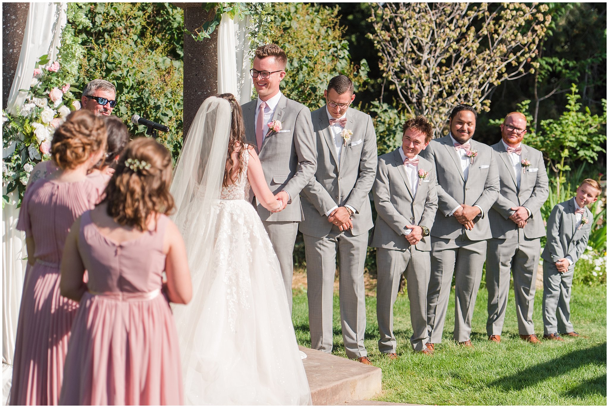 Wedding party during ceremony | Oak Hills Utah Dusty Rose and Gray Summer Wedding | Jessie and Dallin Photography