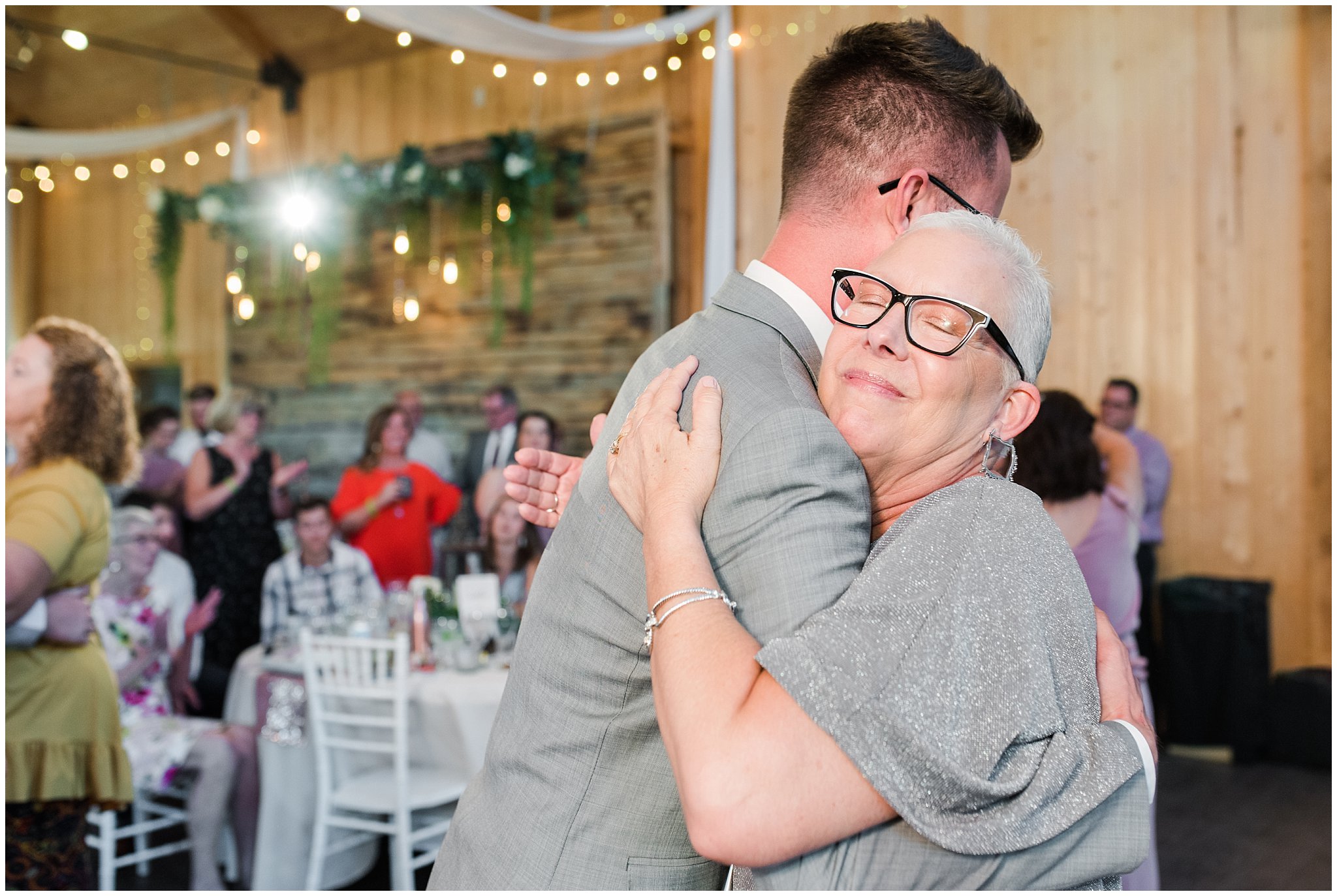 Mother son dance in barn | Oak Hills Utah Dusty Rose and Gray Summer Wedding | Jessie and Dallin Photography