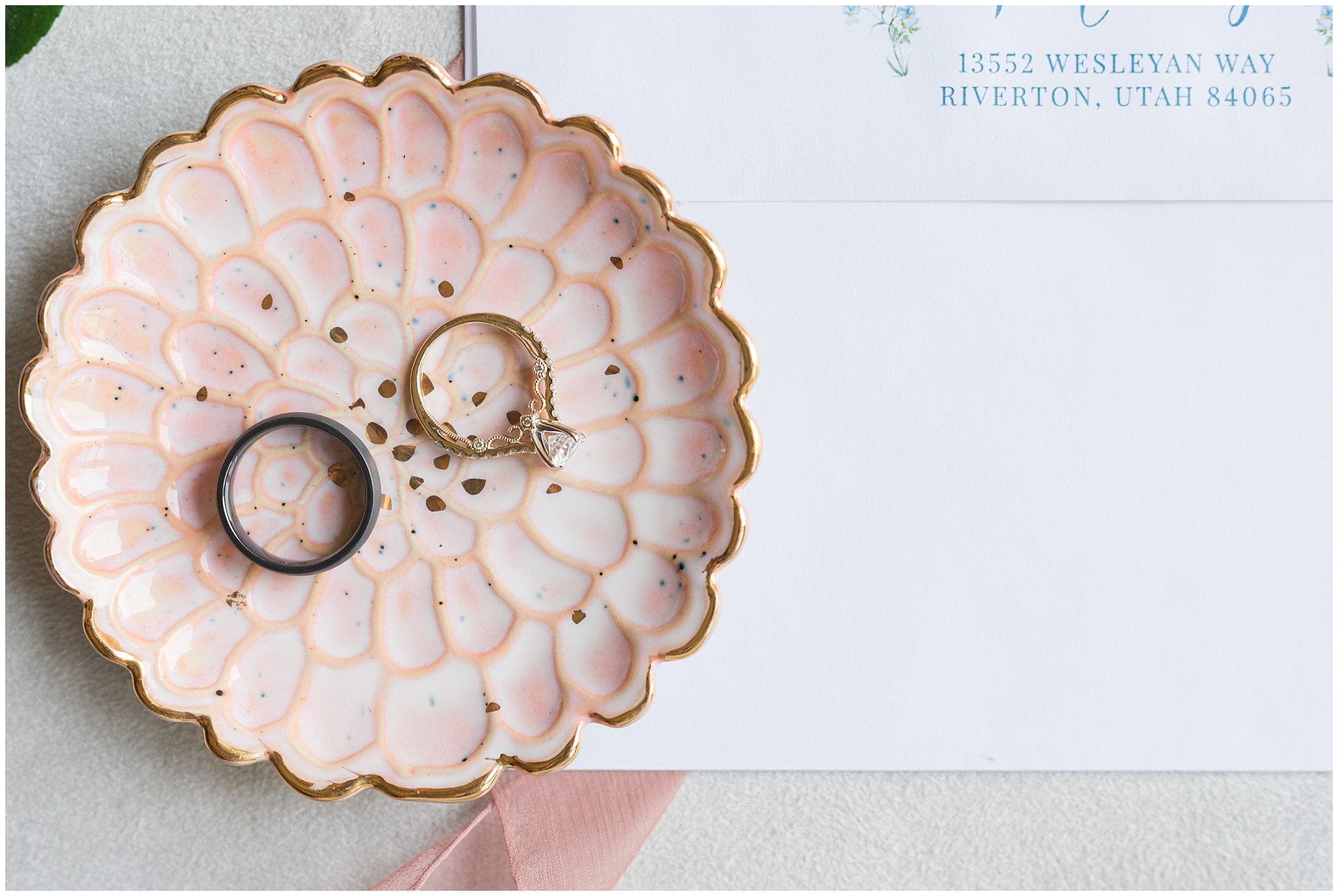 Invitation suite and wedding rings on blush dish | Wadley Farms Summer Wedding | Jessie and Dallin Photography