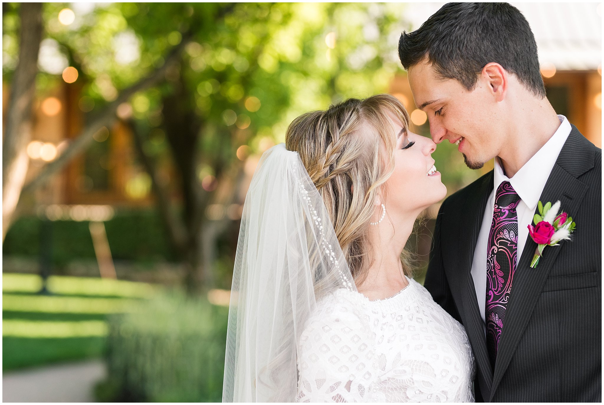 Bride and groom portraits candid moments | white and deep pink florals with black suit and lace dress | Wadley Farms Summer Wedding | Jessie and Dallin Photography
