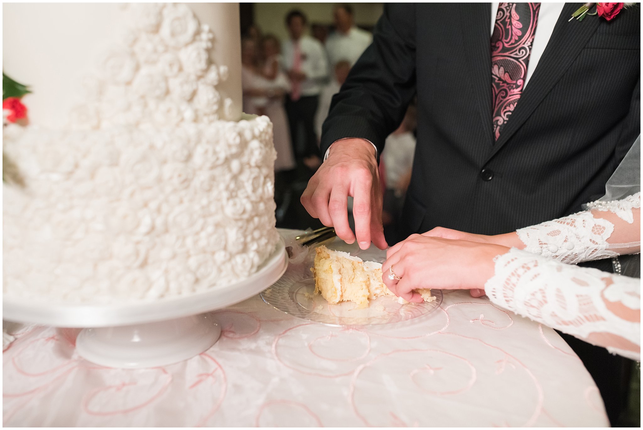 Caking cutting and smashing during reception in the barn | Wadley Farms Summer Wedding | Jessie and Dallin Photography