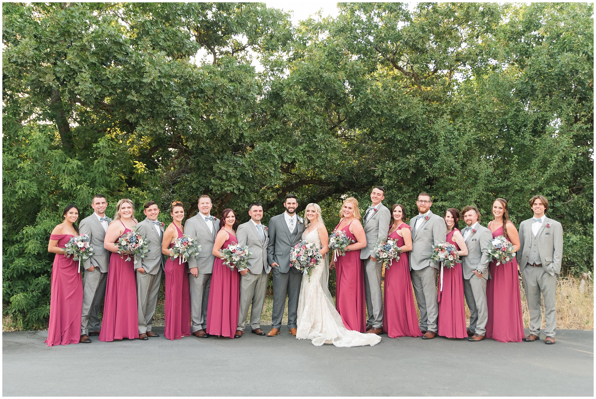 Wedding party wearing gray suits and blue ties and maroon dresses | Dusty Blue and Rose Summer Wedding at Oak Hills Utah | Jessie and Dallin Photography