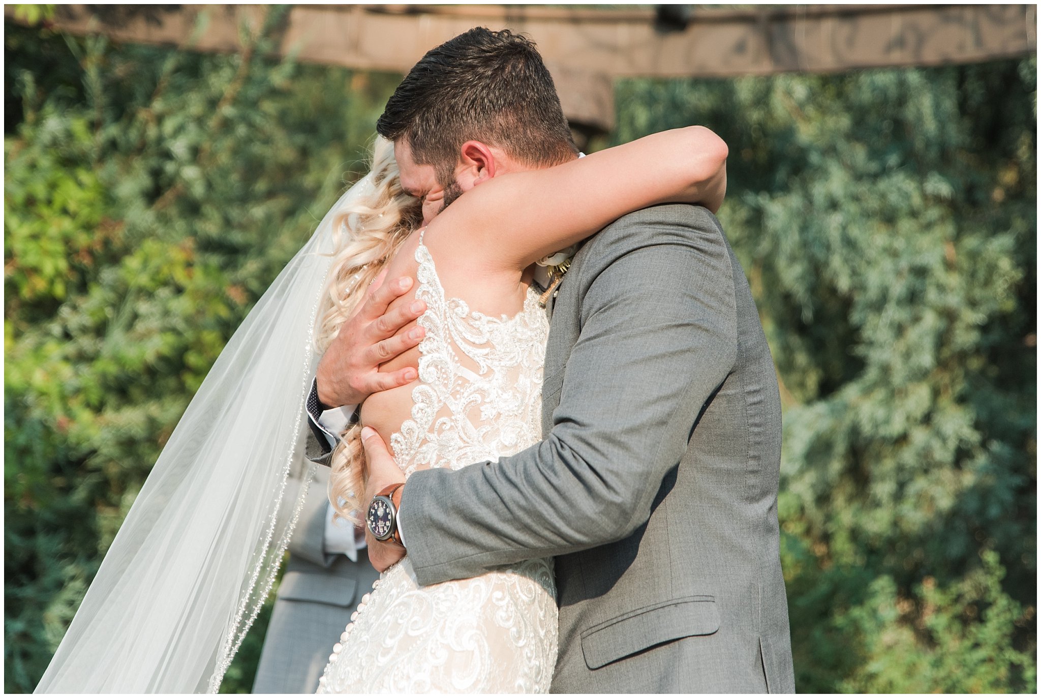 Hug after first kiss during wedding ceremony | Dusty Blue and Rose Summer Wedding at Oak Hills Utah | Jessie and Dallin Photography