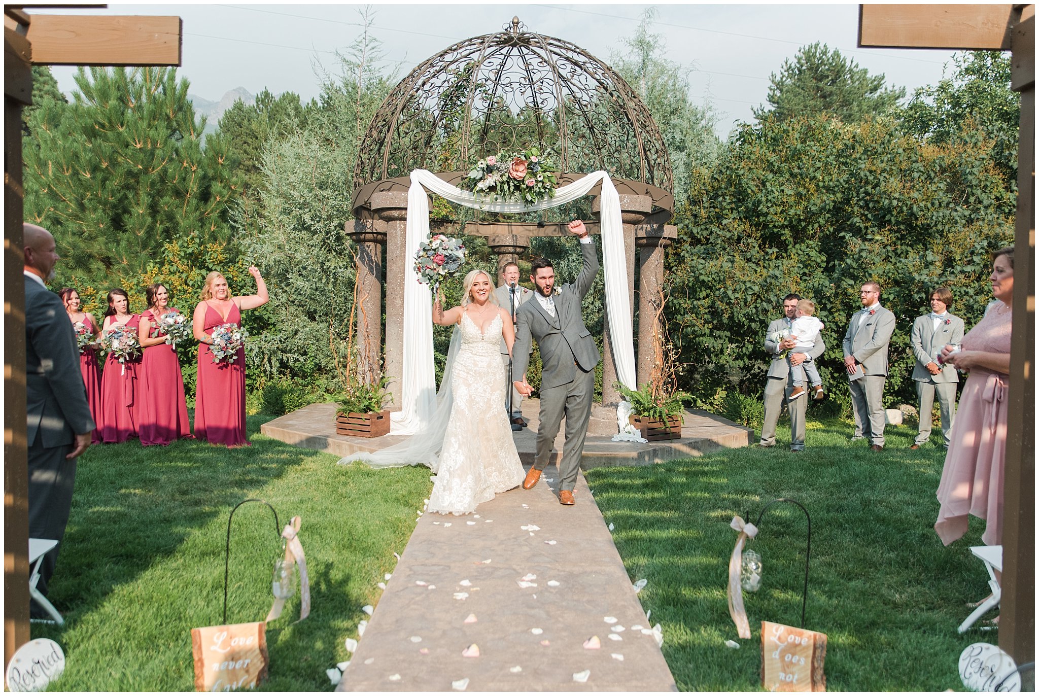 Bride and Groom celebrate after wedding ceremony | Dusty Blue and Rose Summer Wedding at Oak Hills Utah | Jessie and Dallin Photography