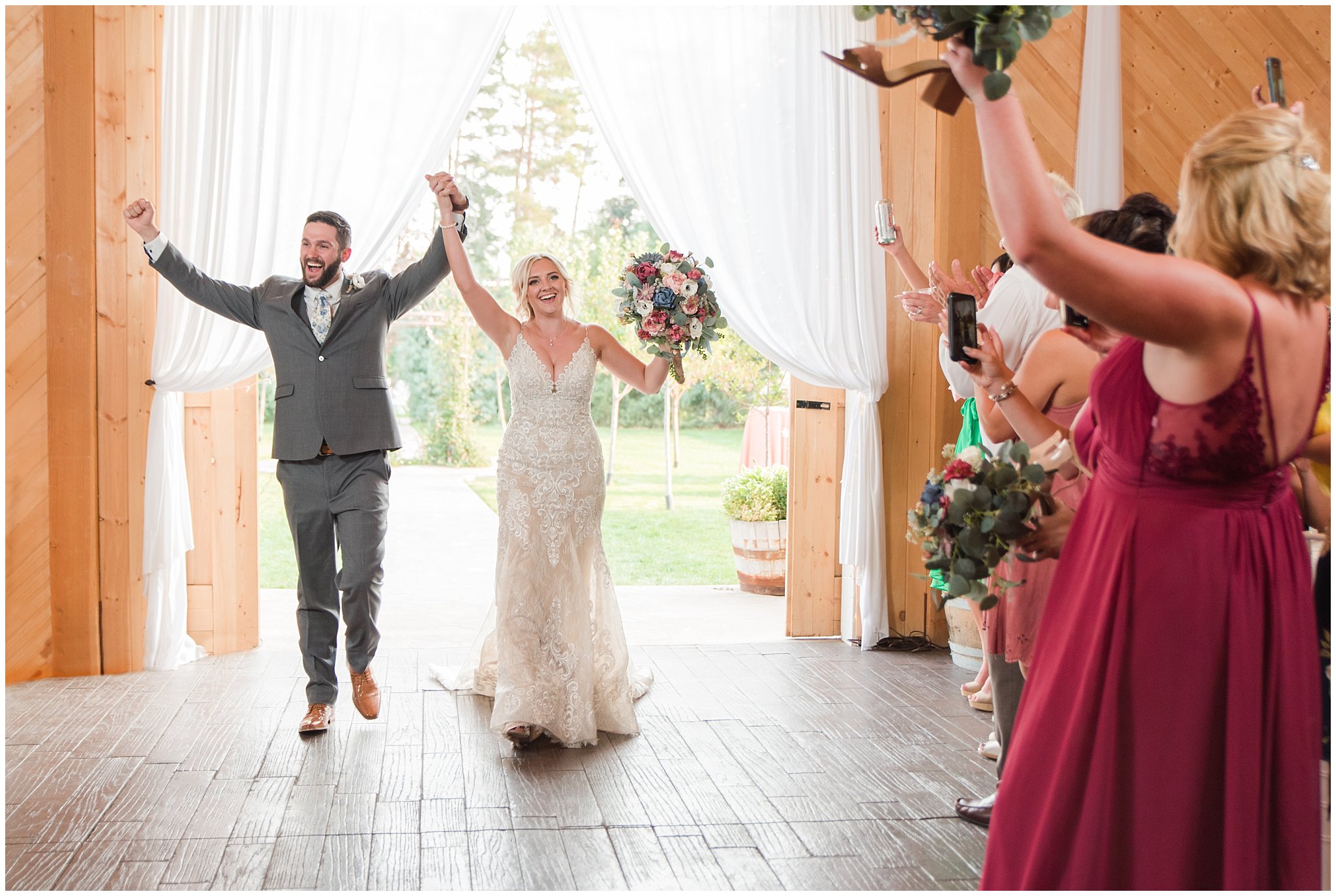 Grand entrance in barn | Dusty Blue and Rose Summer Wedding at Oak Hills Utah | Jessie and Dallin Photography