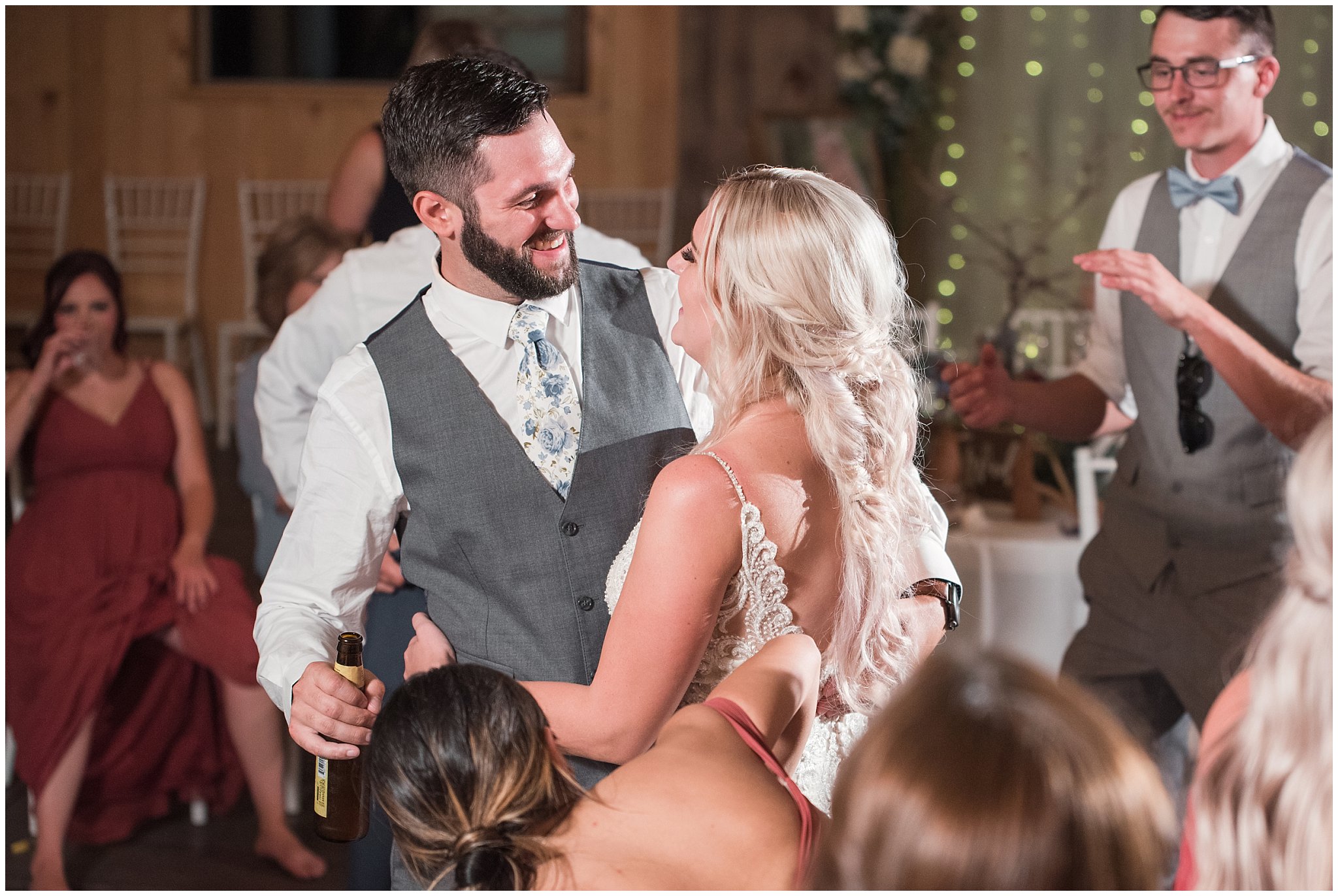 Wedding party dancing and celebrating | Dusty Blue and Rose Summer Wedding at Oak Hills Utah | Jessie and Dallin Photography