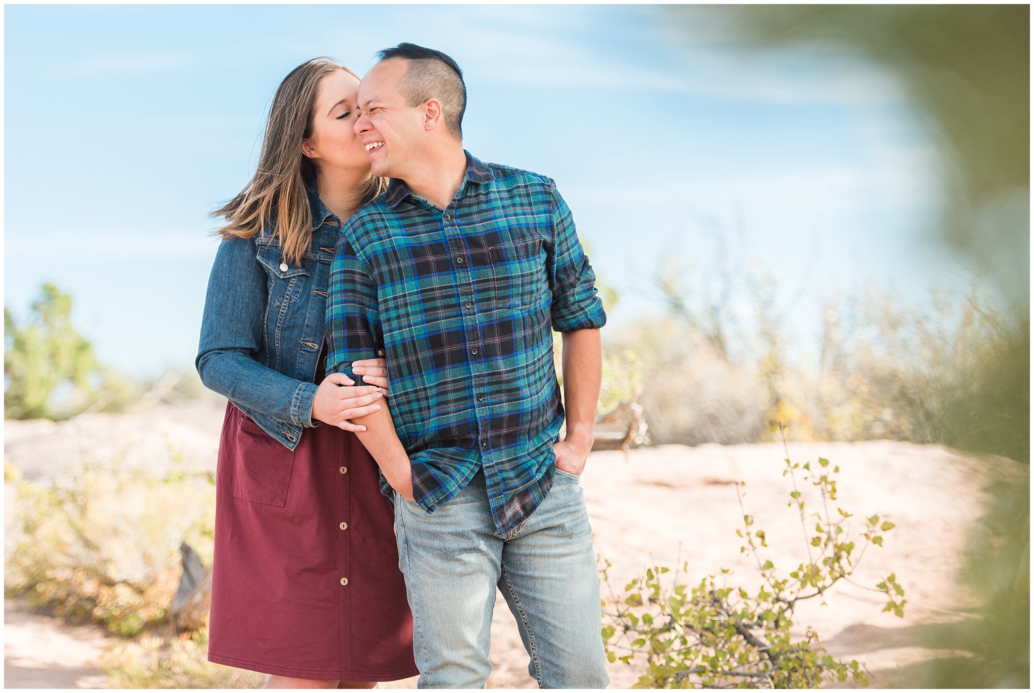 Couple in casual dress during engagement session at Dead Horse Point | Arches National Park and Dead Horse Point Engagement | Jessie and Dallin Photography