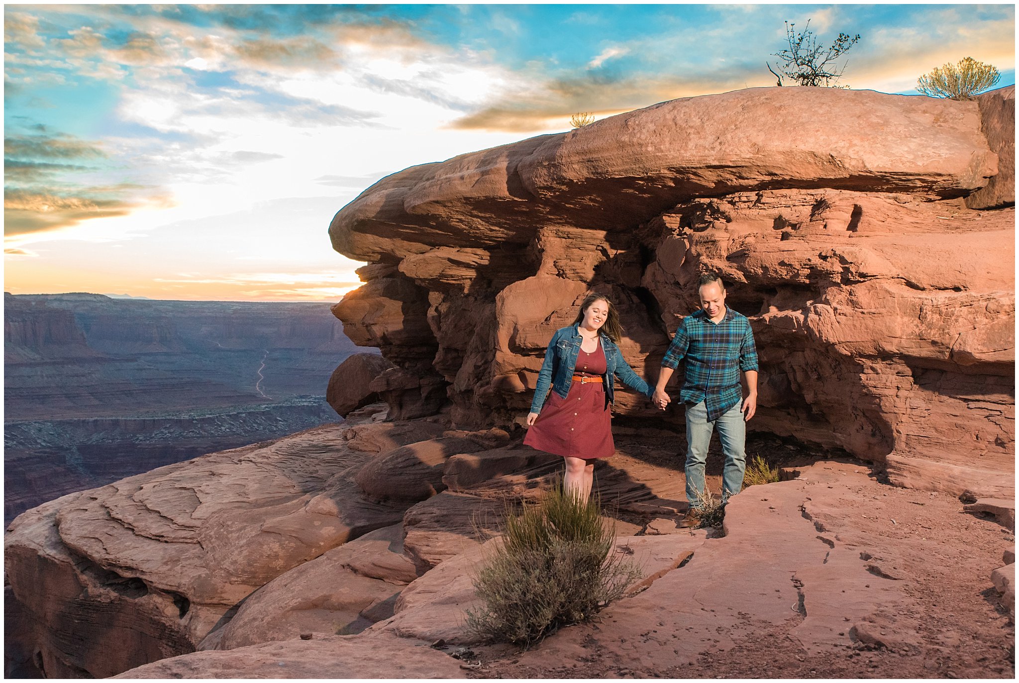 Couple in casual dress during sunset engagement session at Dead Horse Point | Arches National Park and Dead Horse Point Engagement | Jessie and Dallin Photography