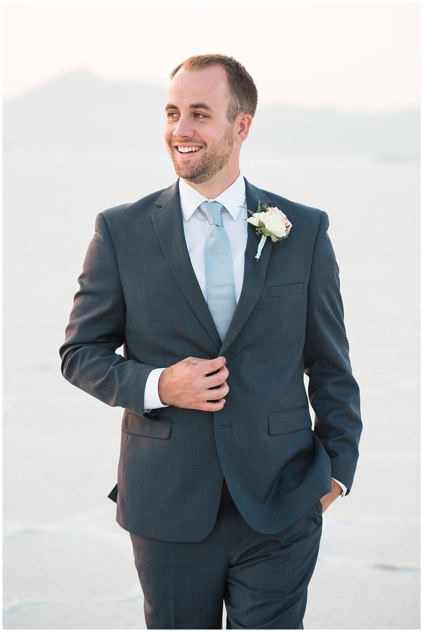 Groom in blue suit for Adventure Session | Bonneville Salt Flats Sunset Wedding Formal Session | Jessie and Dallin Photography