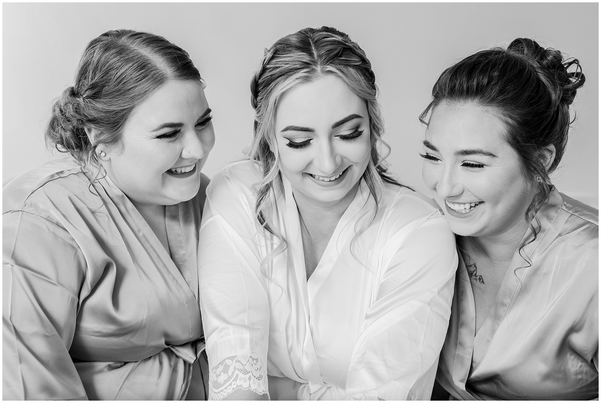 Bride and bridesmaids in robes | Sage Green and Gray Summer Wedding at Oak Hills | Jessie and Dallin Photography