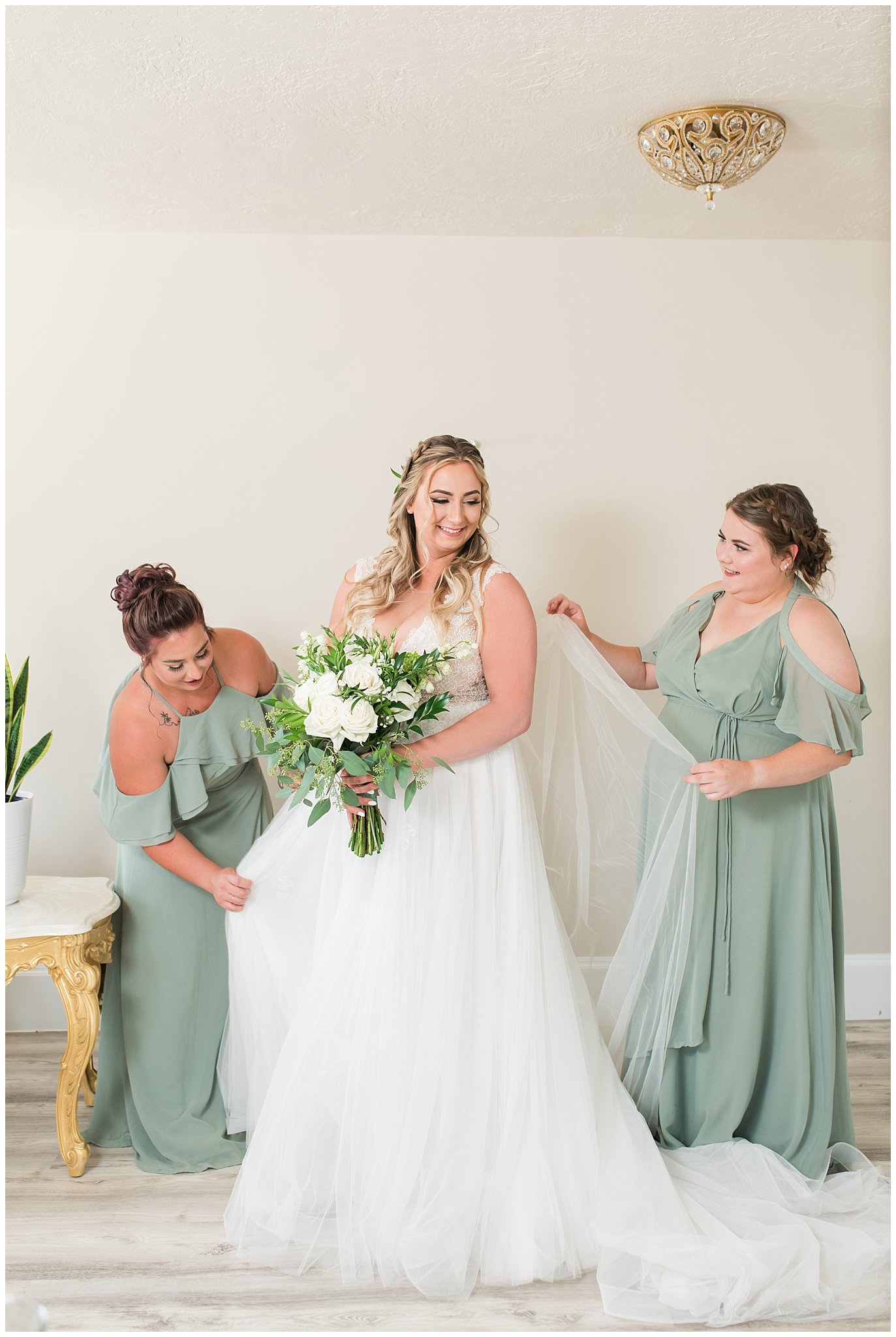 Bride and bridesmaids getting ready wearing sage green dresses | Sage Green and Gray Summer Wedding at Oak Hills | Jessie and Dallin Photography