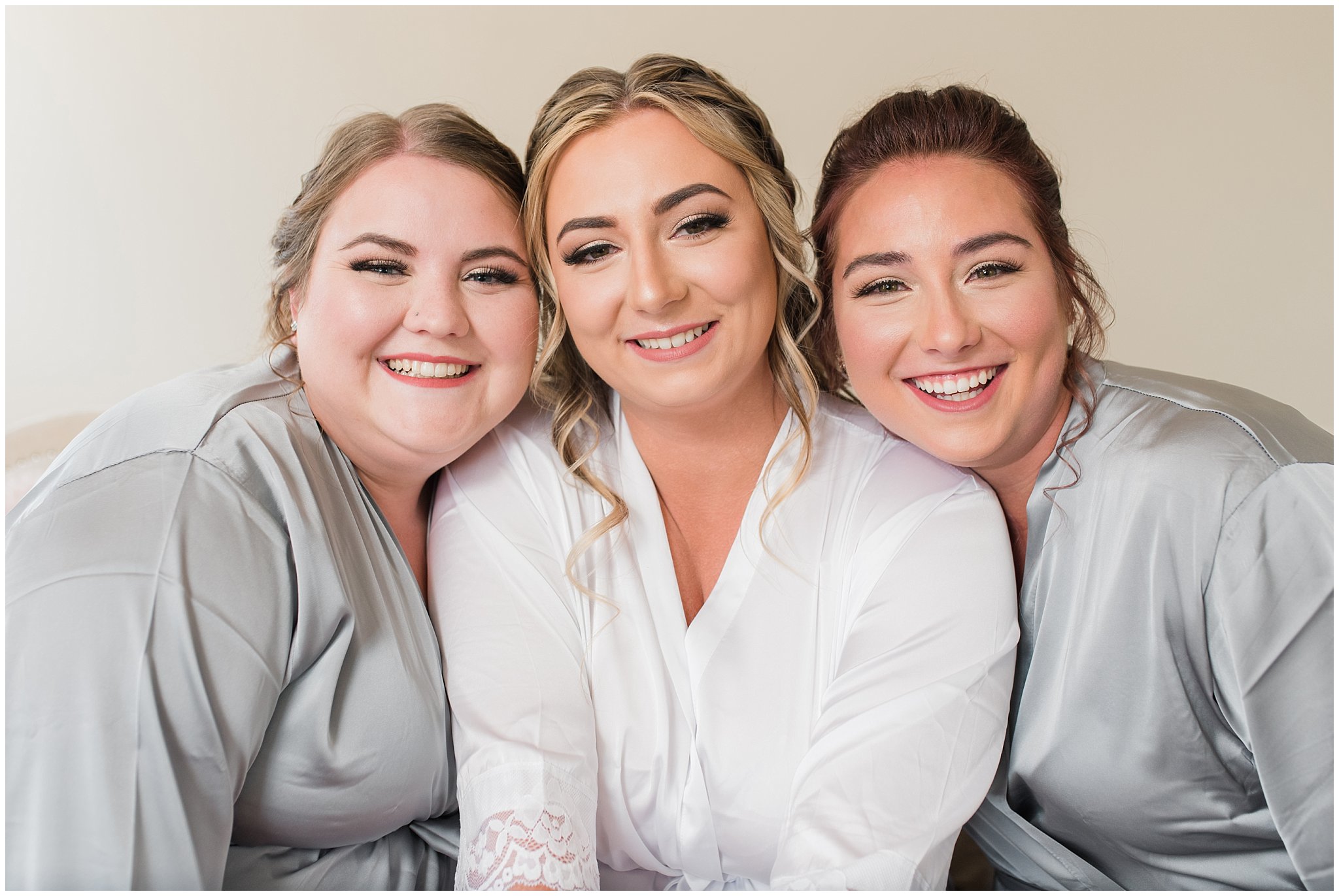 Bride and bridesmaids in robes | Sage Green and Gray Summer Wedding at Oak Hills | Jessie and Dallin Photography