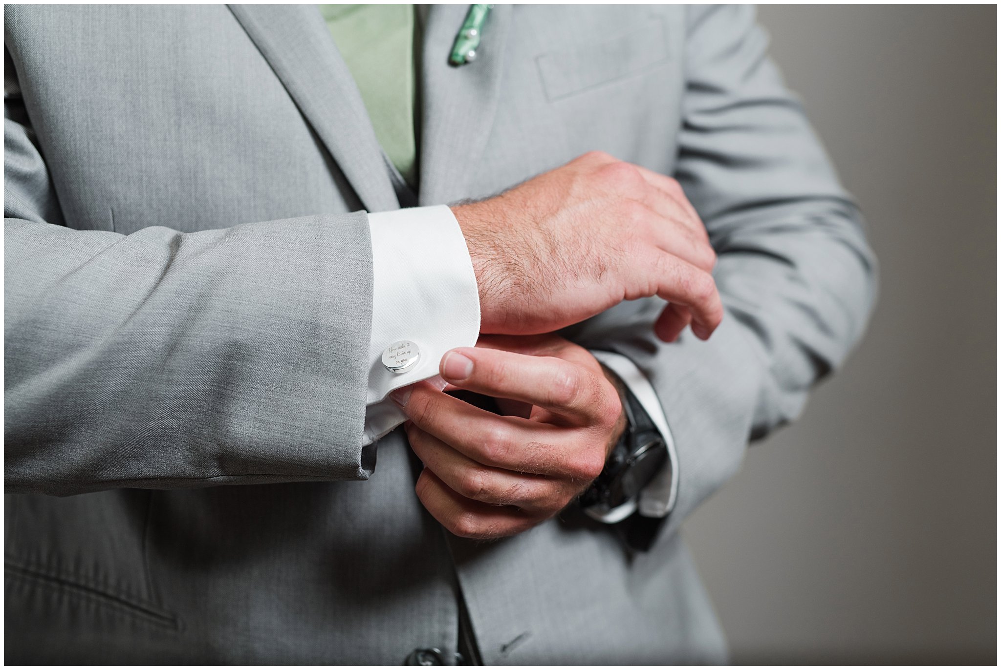 Groom opening gift of custom cufflinks with message | Sage Green and Gray Summer Wedding at Oak Hills | Jessie and Dallin Photography