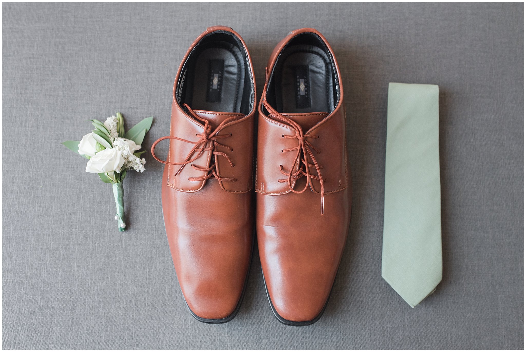 Groom details with cognac shoes, grey suit, sage green tie, and polka dot socks | Sage Green and Gray Summer Wedding at Oak Hills | Jessie and Dallin Photography