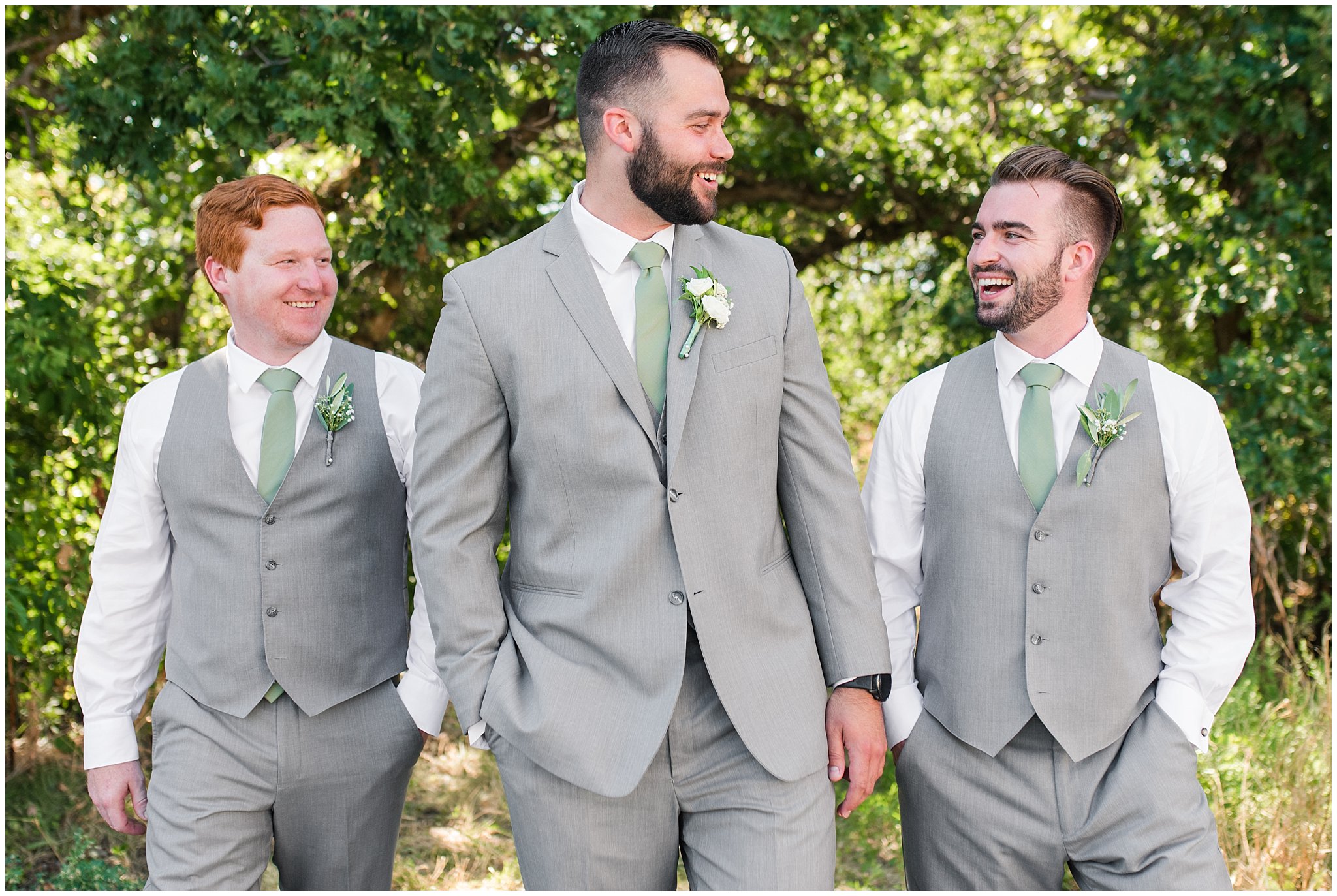 Wedding party in woods wearing gray suit and vests and sage green tie and champagne dress with sage green bridesmaid dresses | Sage Green and Gray Summer Wedding at Oak Hills | Jessie and Dallin Photography