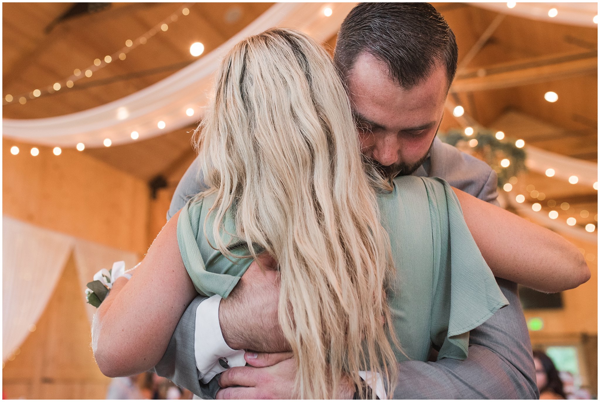 Mother son dance during Oak Hills wedding in the barn | Sage Green and Gray Summer Wedding at Oak Hills | Jessie and Dallin Photography